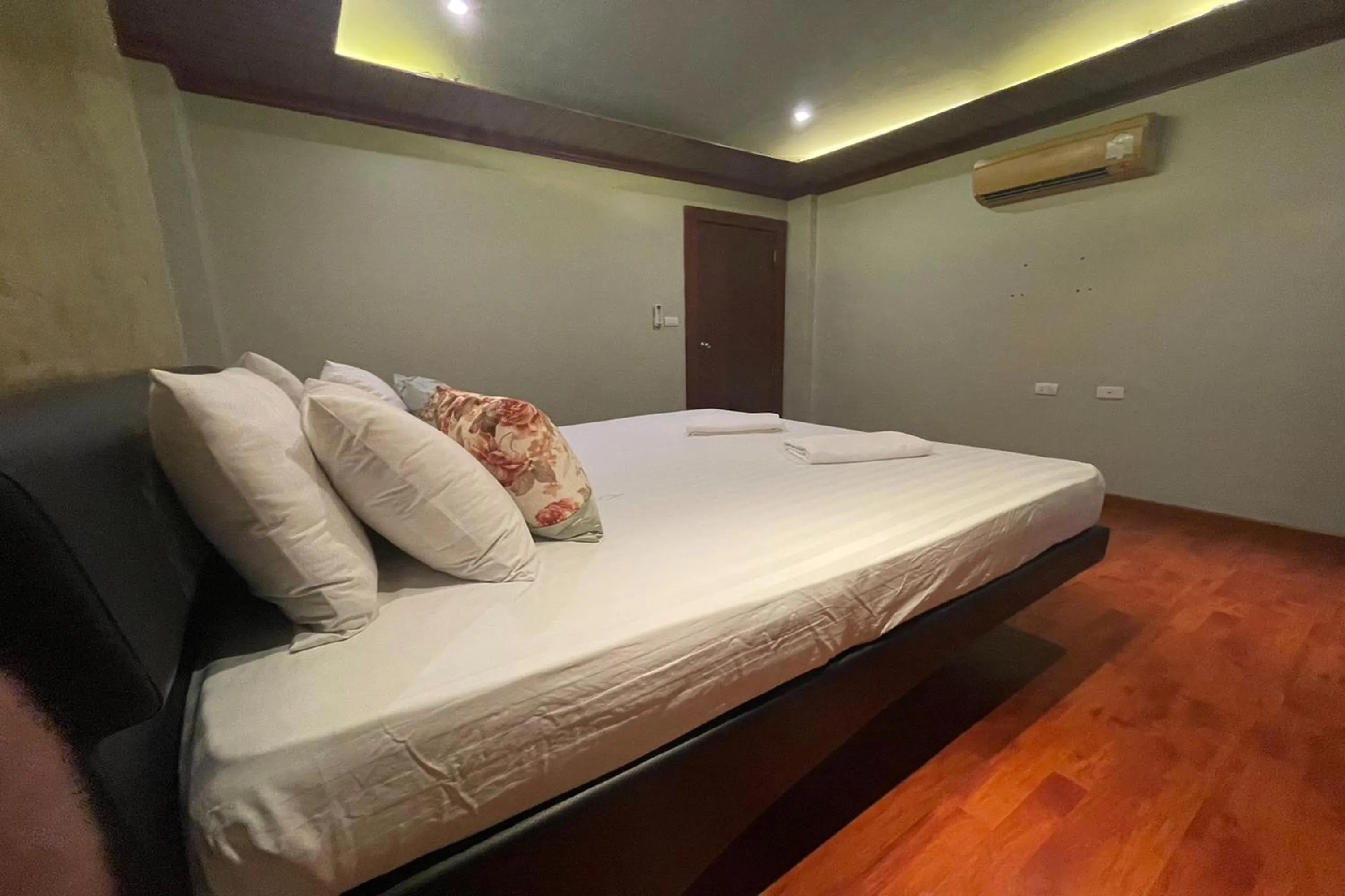 Bed in Landmark Patong Hotel