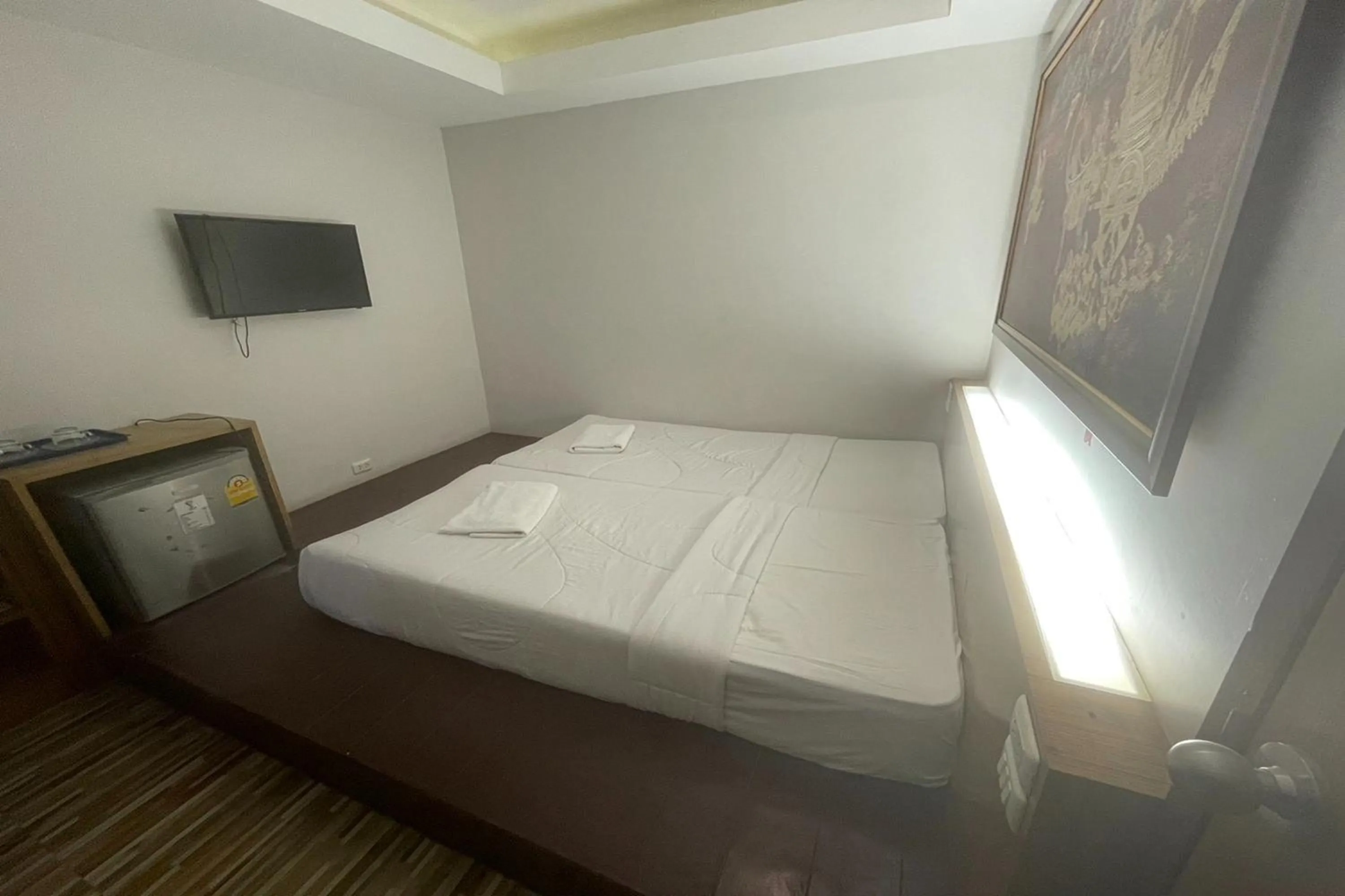 Bed in Landmark Patong Hotel