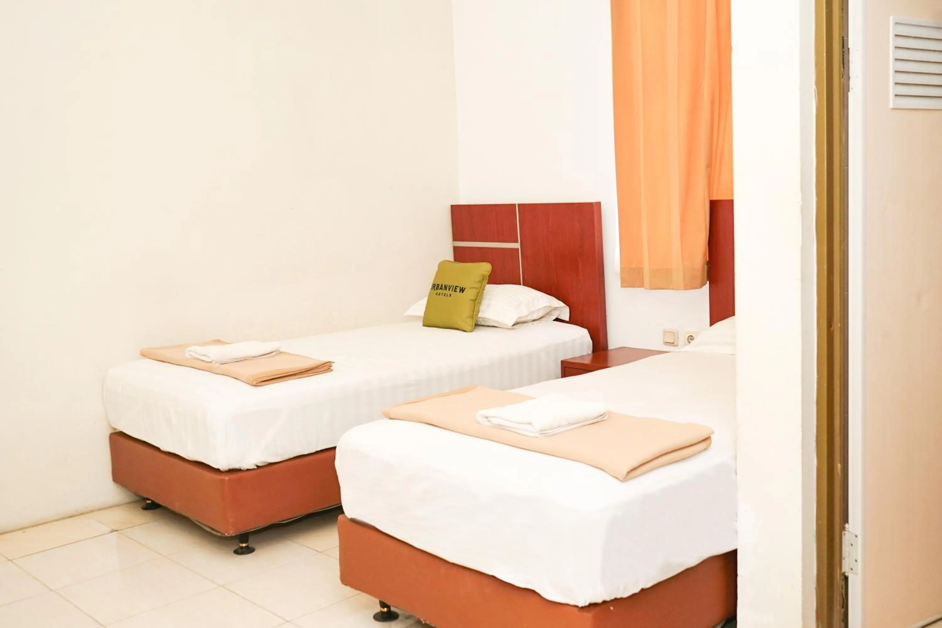 Bedroom, Bed in Urbanview Hotel Syariah Ratu Elok Banjarbaru by RedDoorz