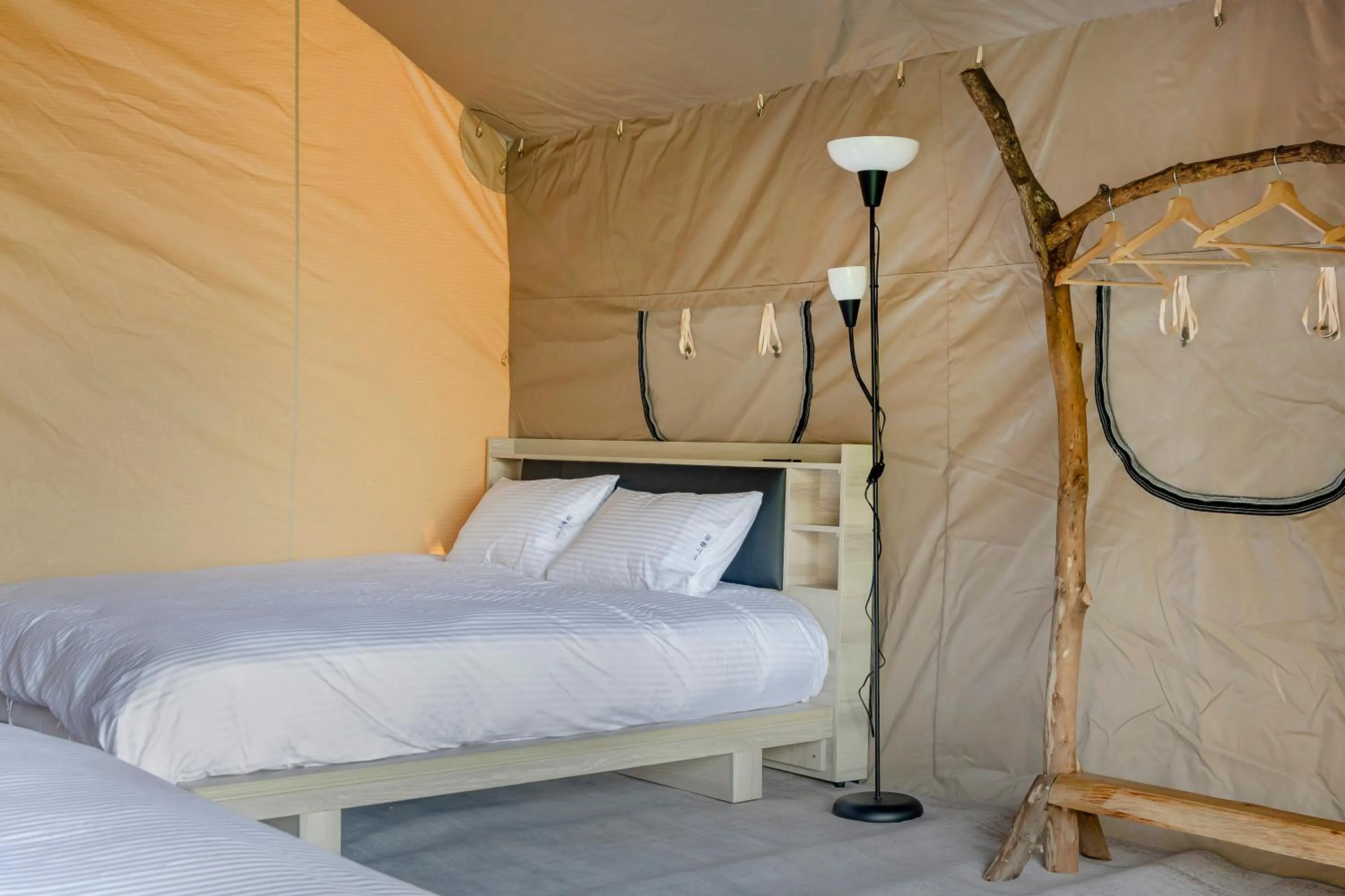 Bed in Grow Tree Glamping