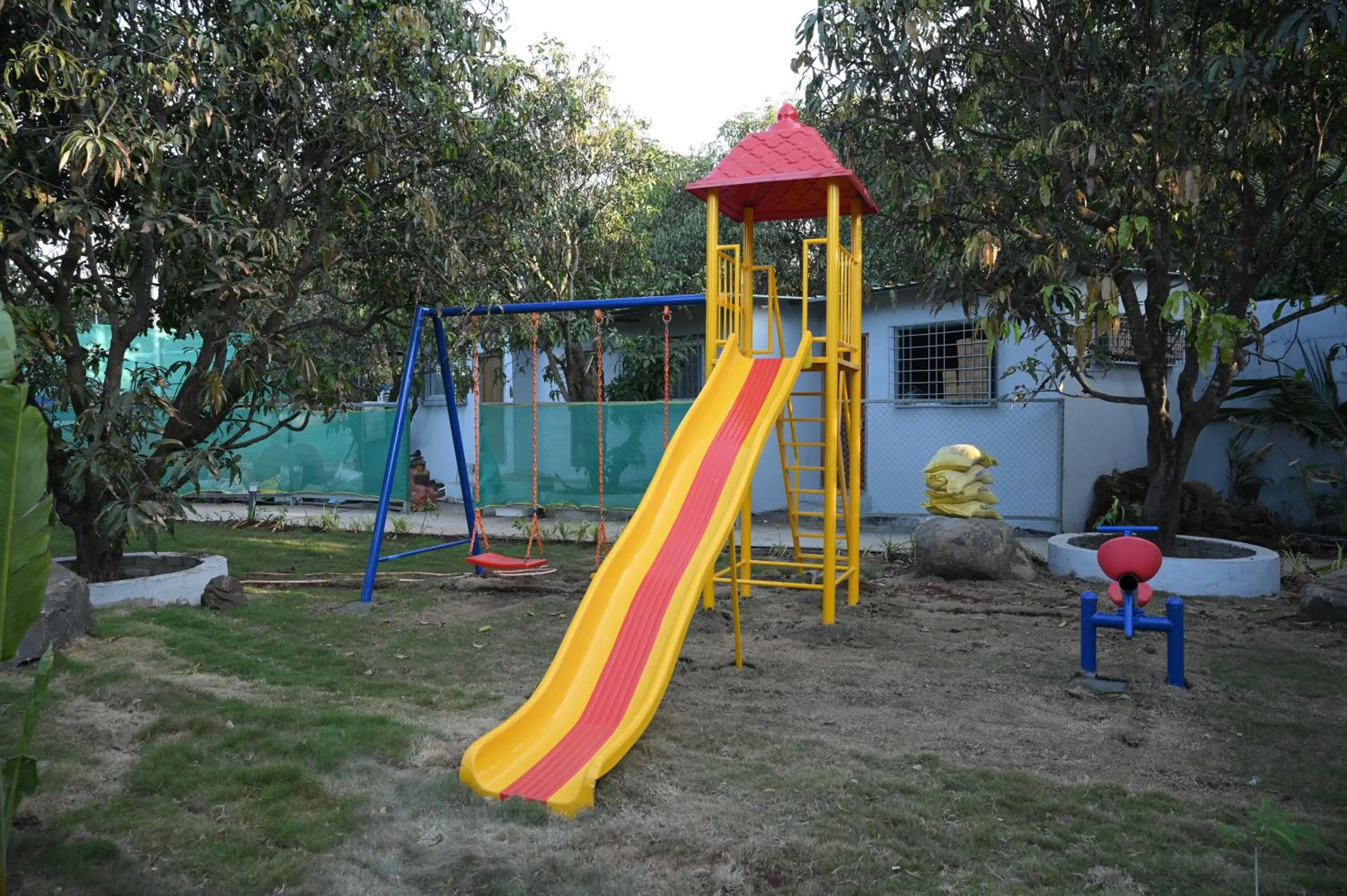 Children play ground in Mango Leaf Lake Resort
