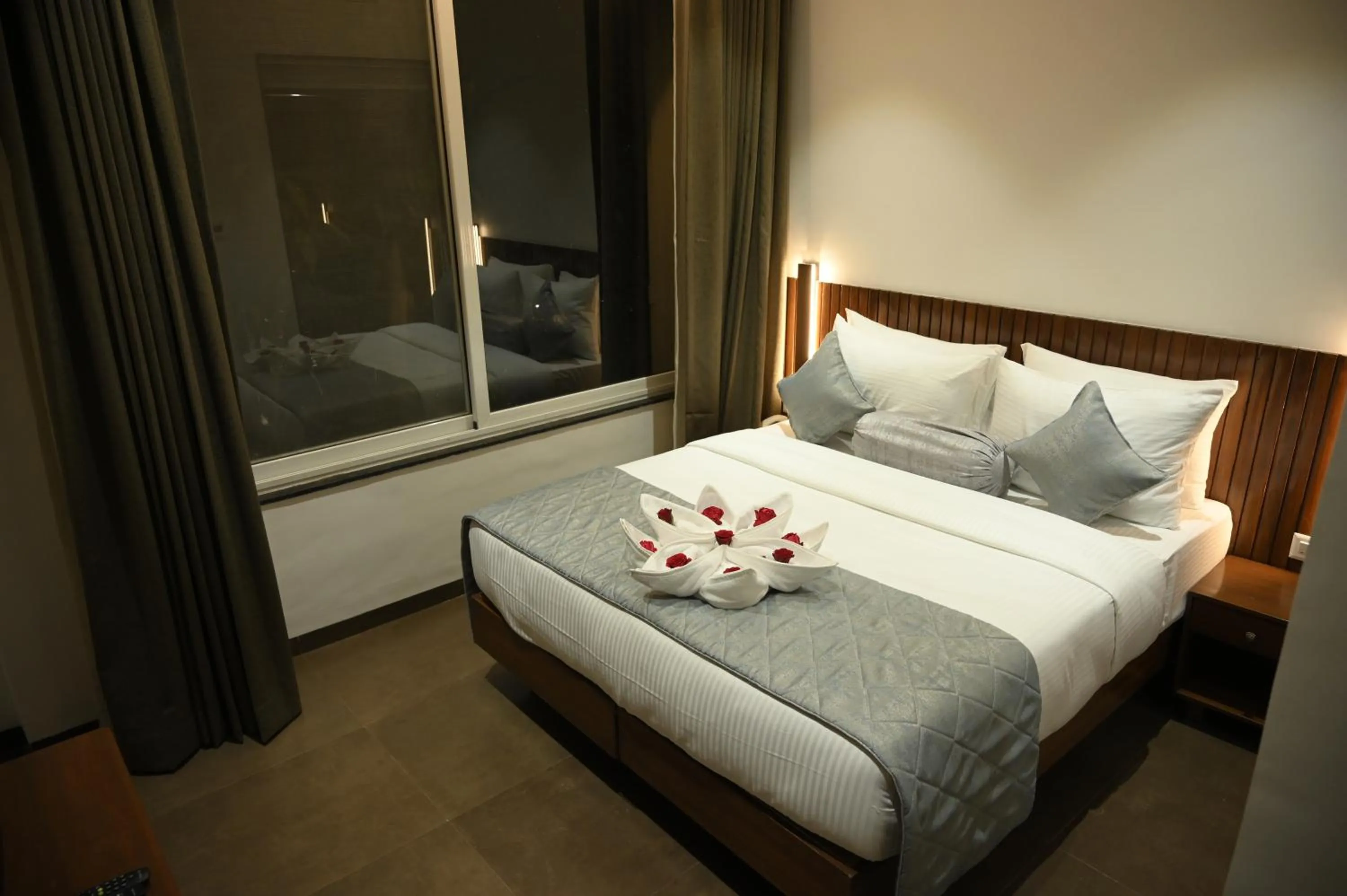 Bed in Mango Leaf Lake Resort