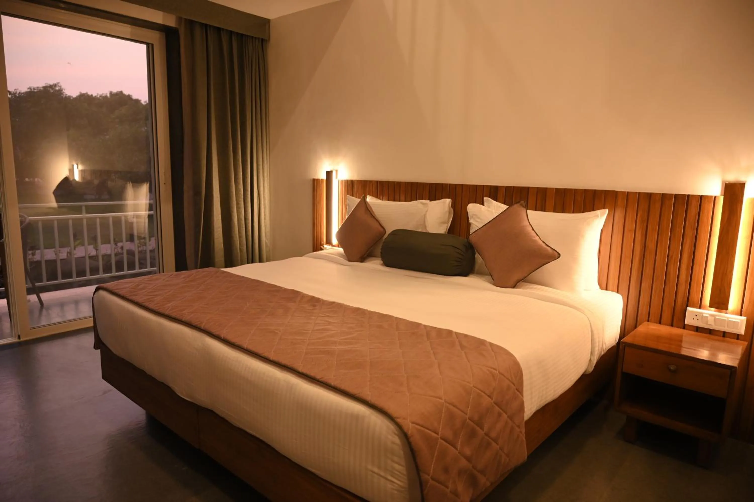 Bed in Mango Leaf Lake Resort