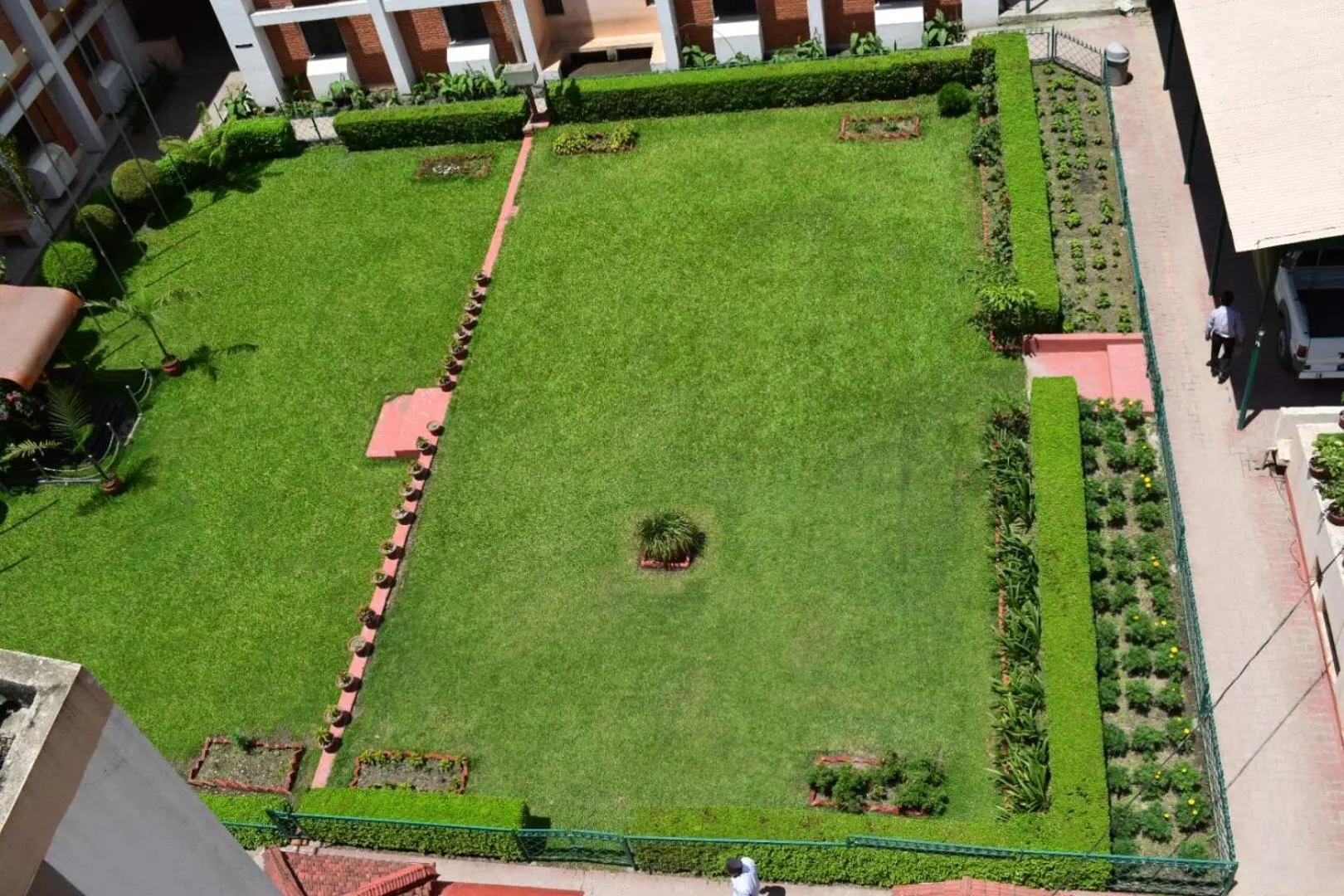 Garden view in Alpine Hotel & Apartment