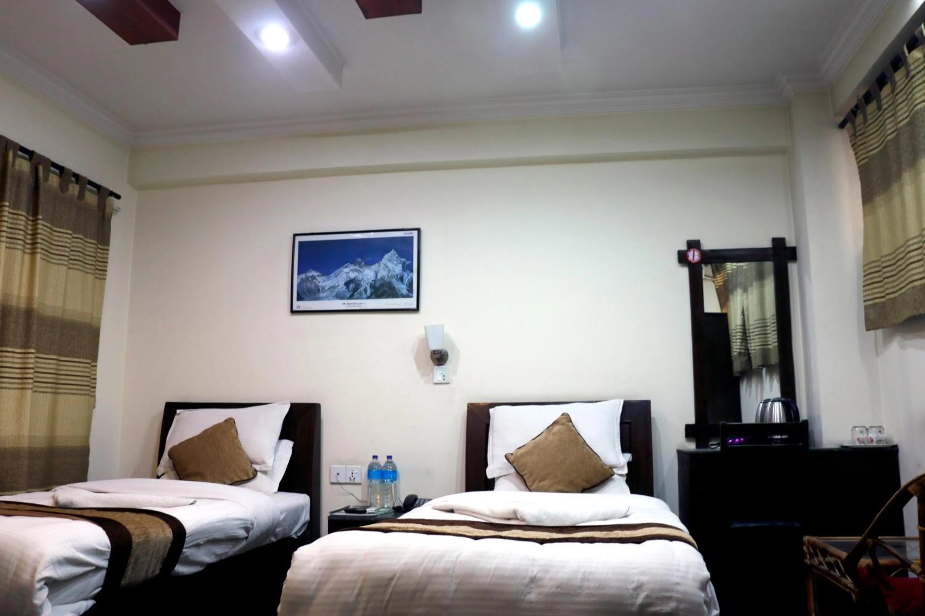 Bedroom in Alpine Hotel & Apartment