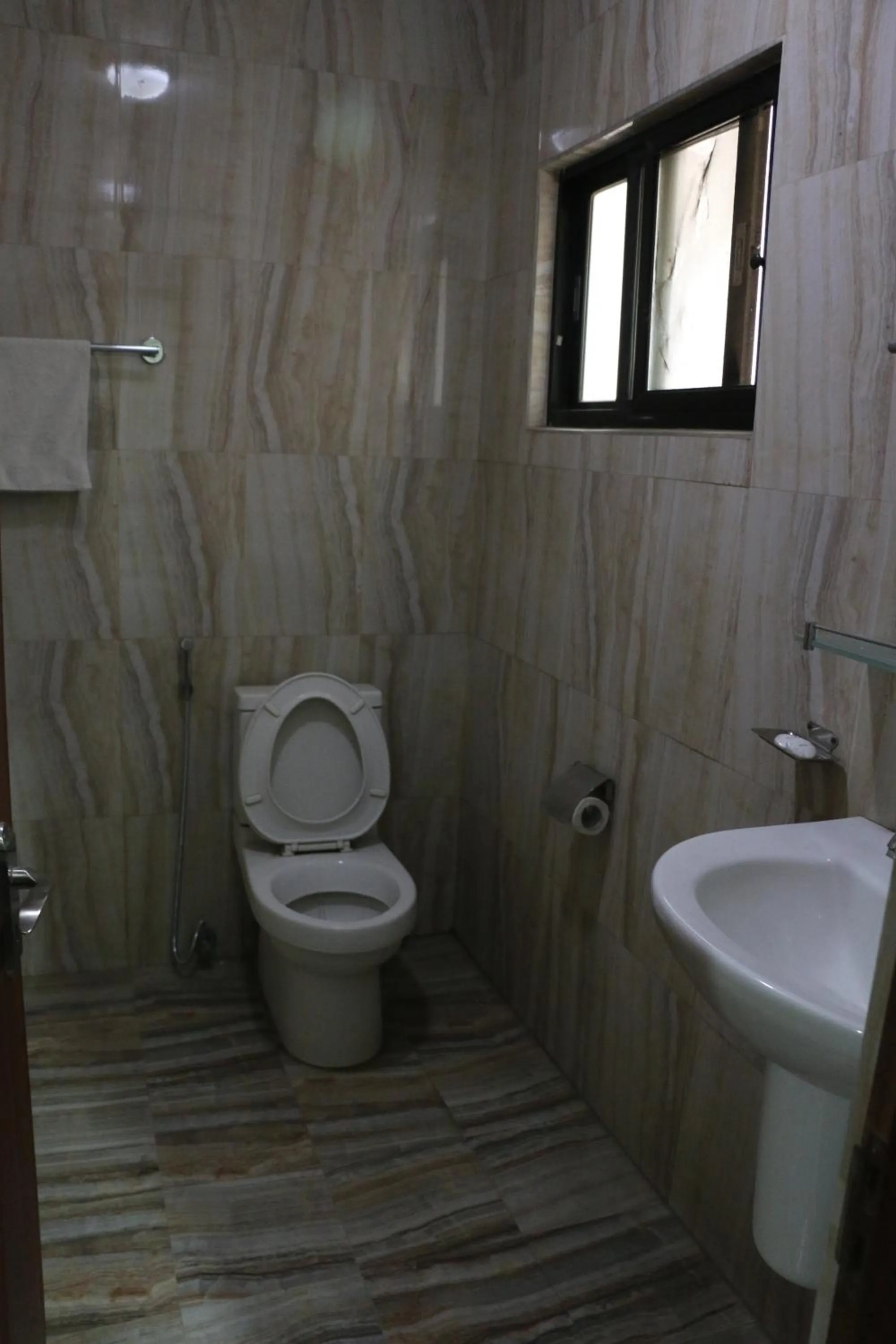 Bathroom in Alpine Hotel & Apartment