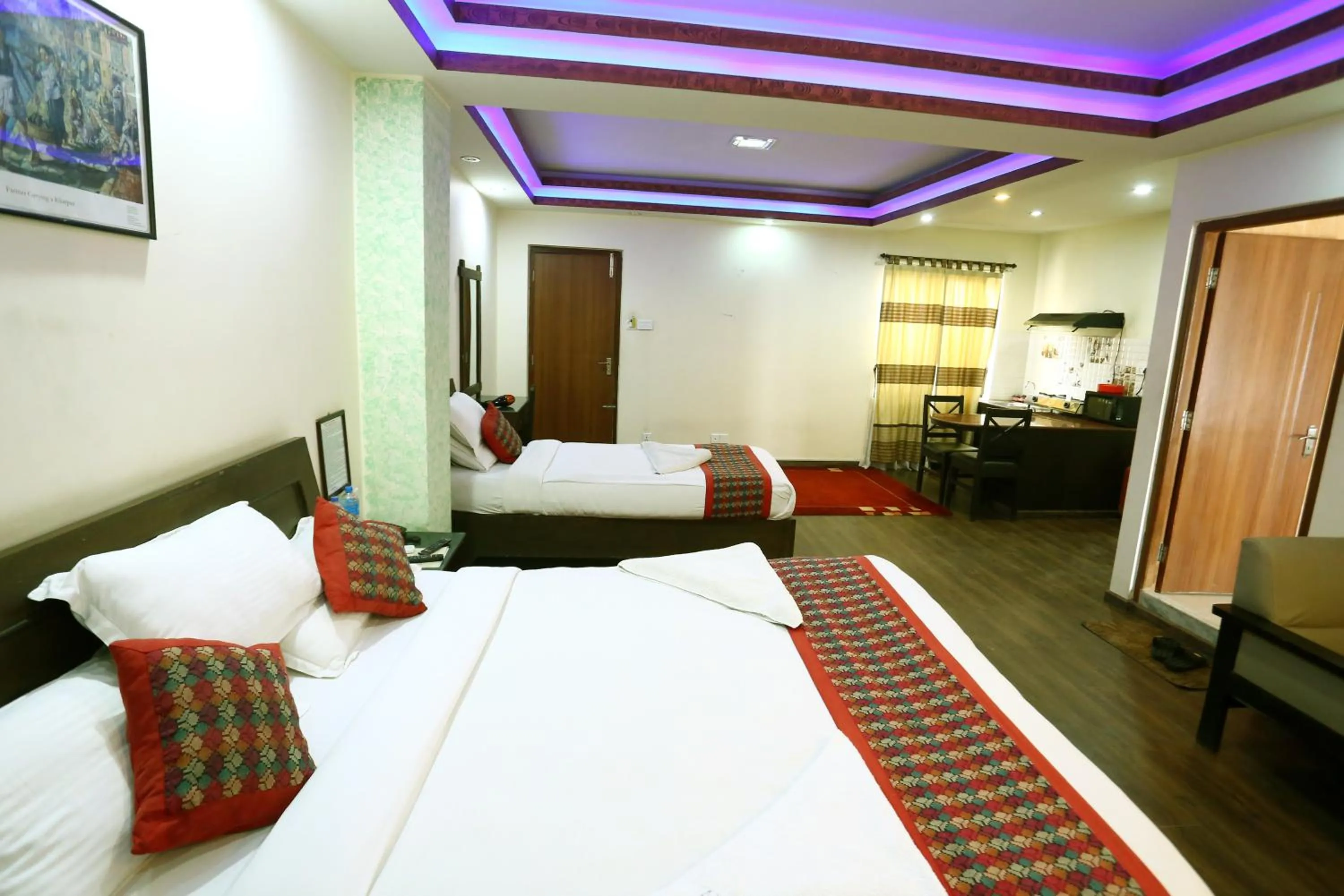 Bedroom in Alpine Hotel & Apartment