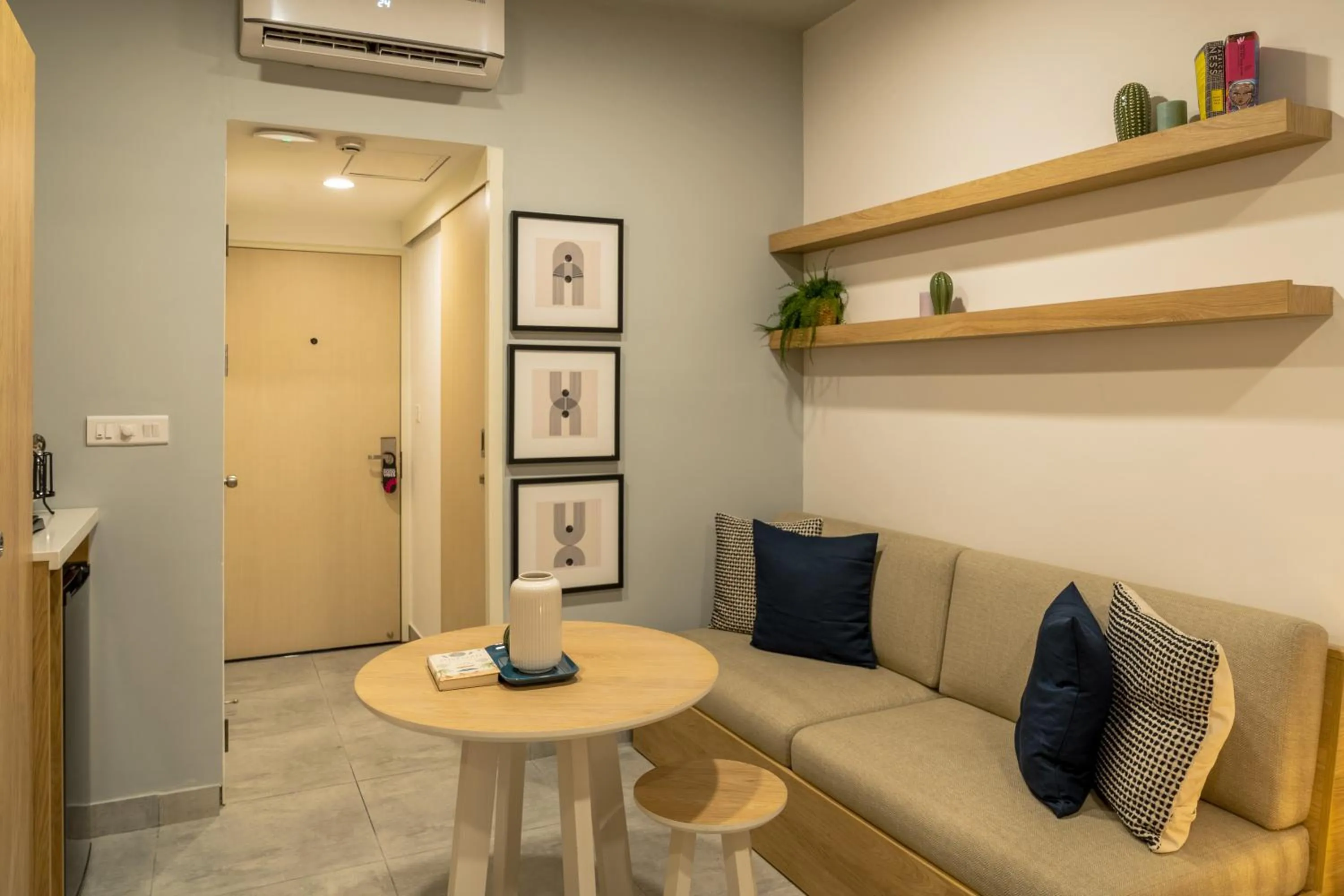 Living room in Olive Hotel Brookefield by Embassy Group