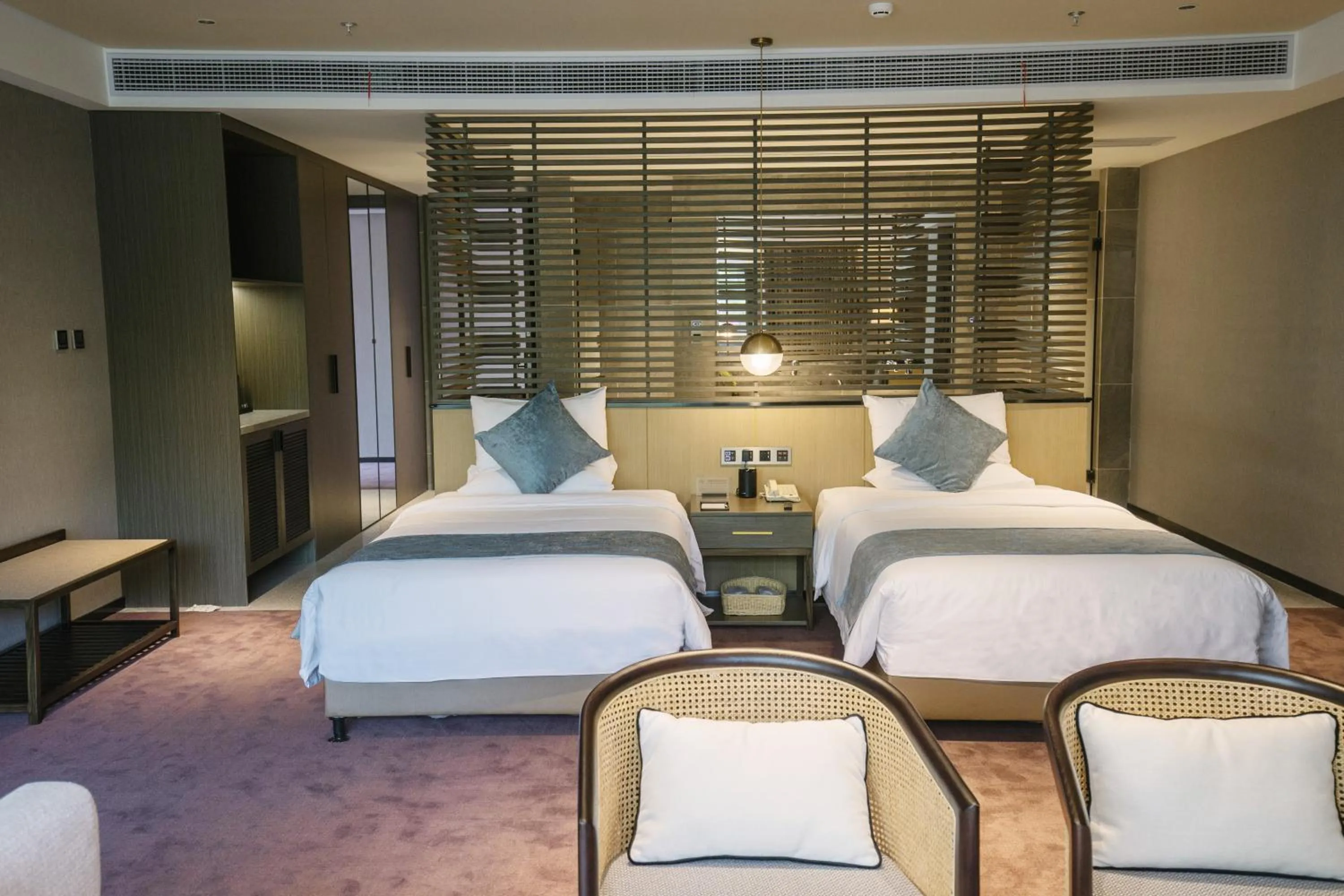 Bed in Novotel Nantong Center