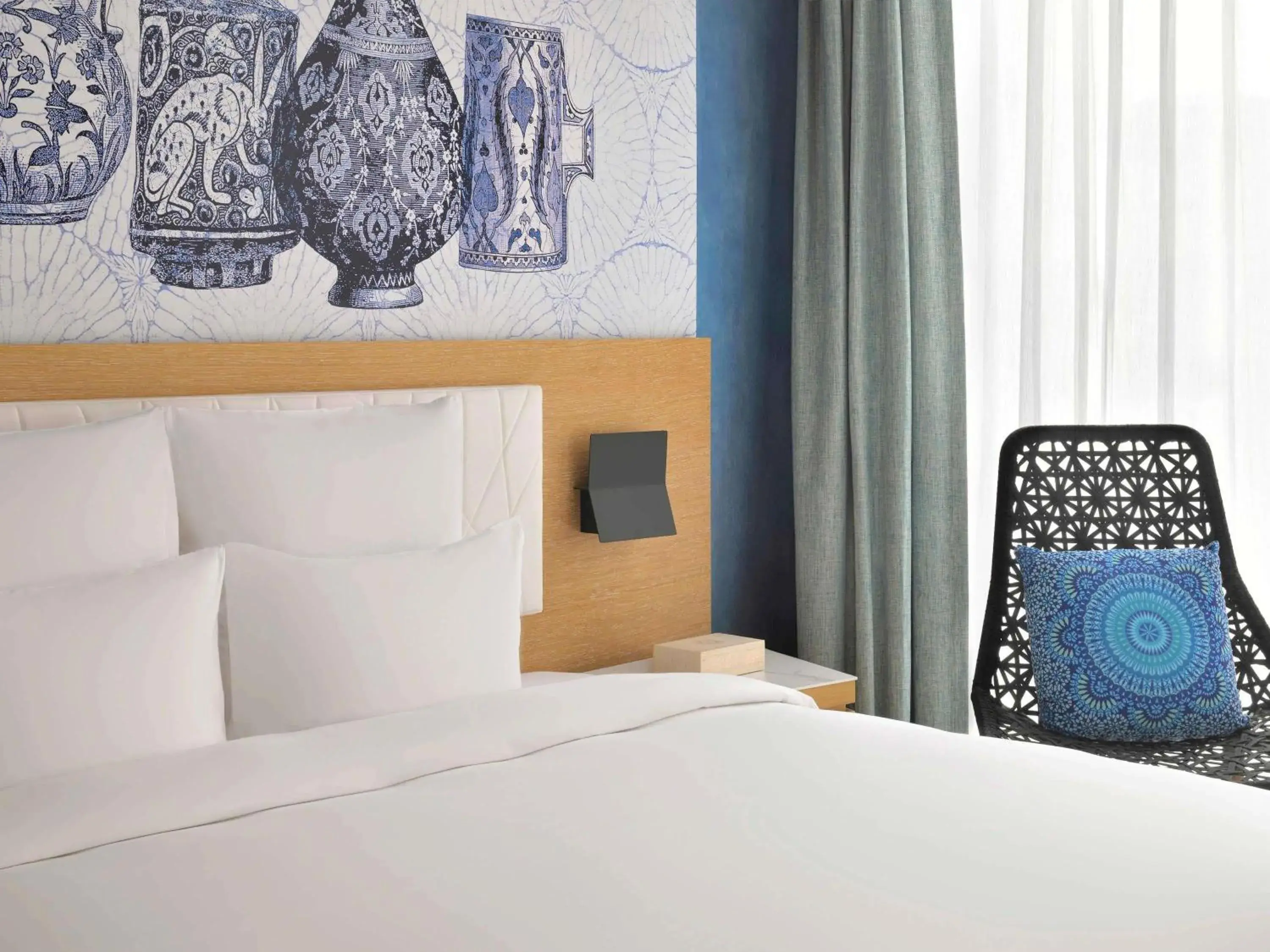 Superior King Room with City View - Accessible in Mövenpick Hotel & Apartments Ghala Muscat Superior King Room with City View - Accessible in Mövenpick Hotel & Apartments Ghala Muscat