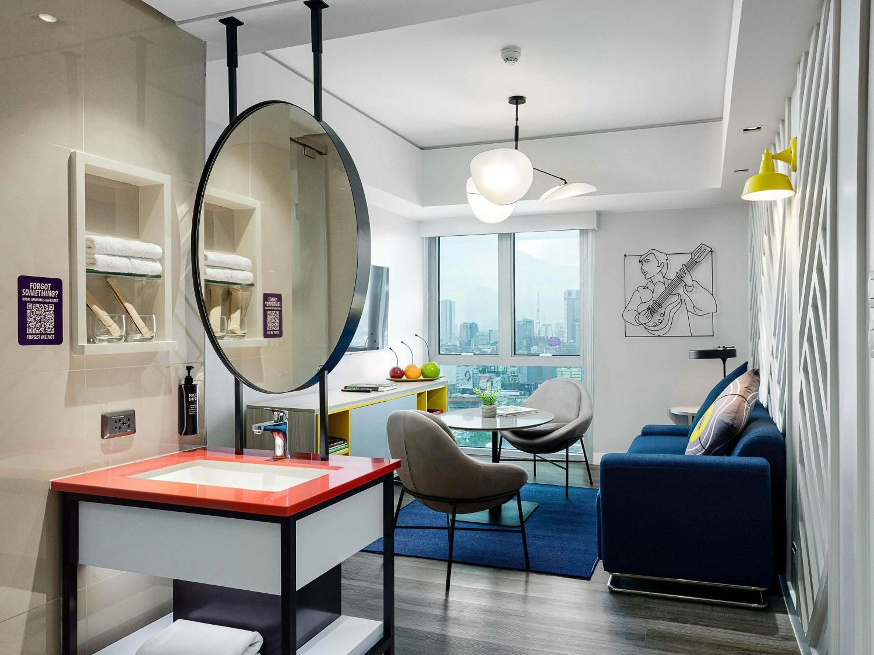 Bedroom in ibis Styles Manila Araneta City