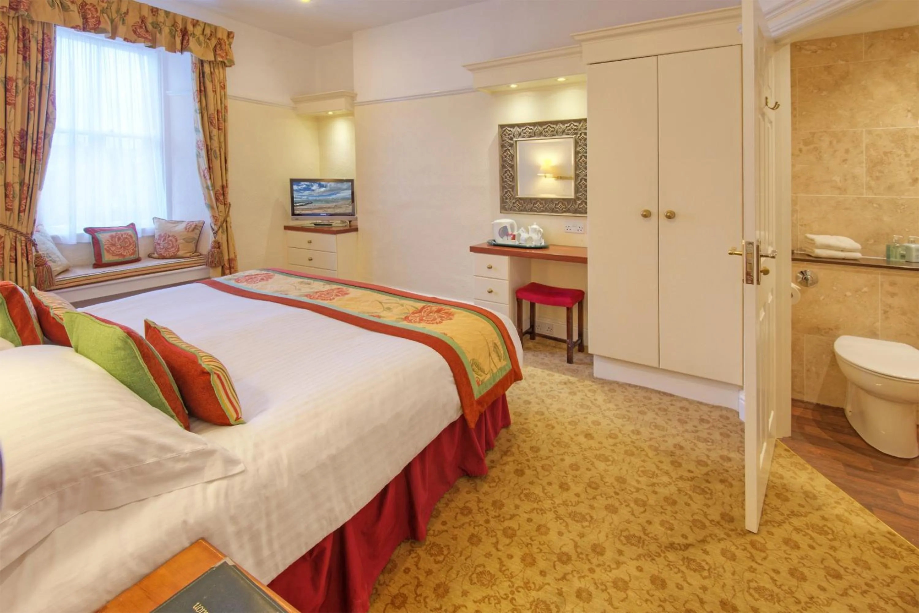 Photo of the whole room, Bed in The Dunstanburgh Castle Hotel