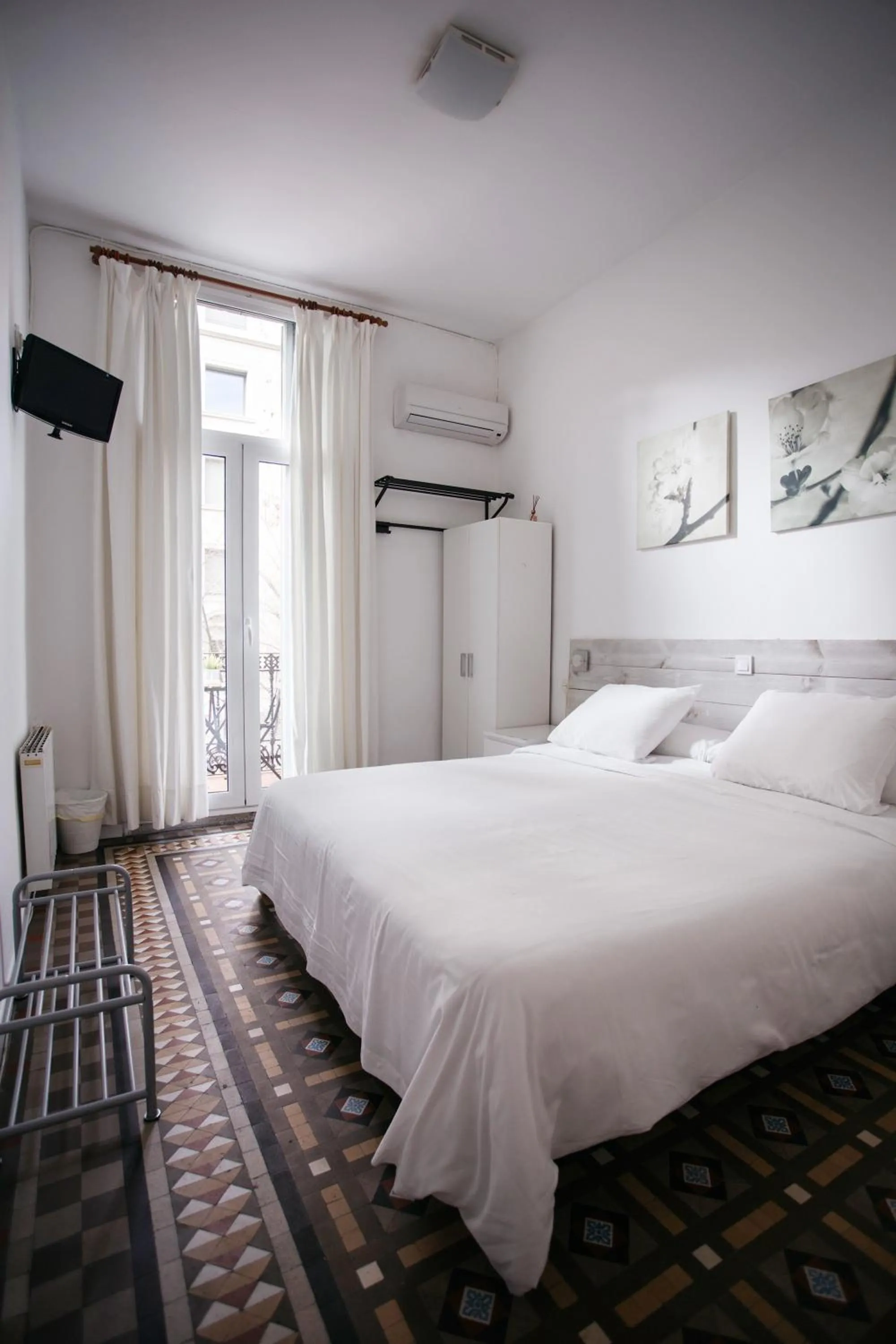 Bed in Hostal Eixample