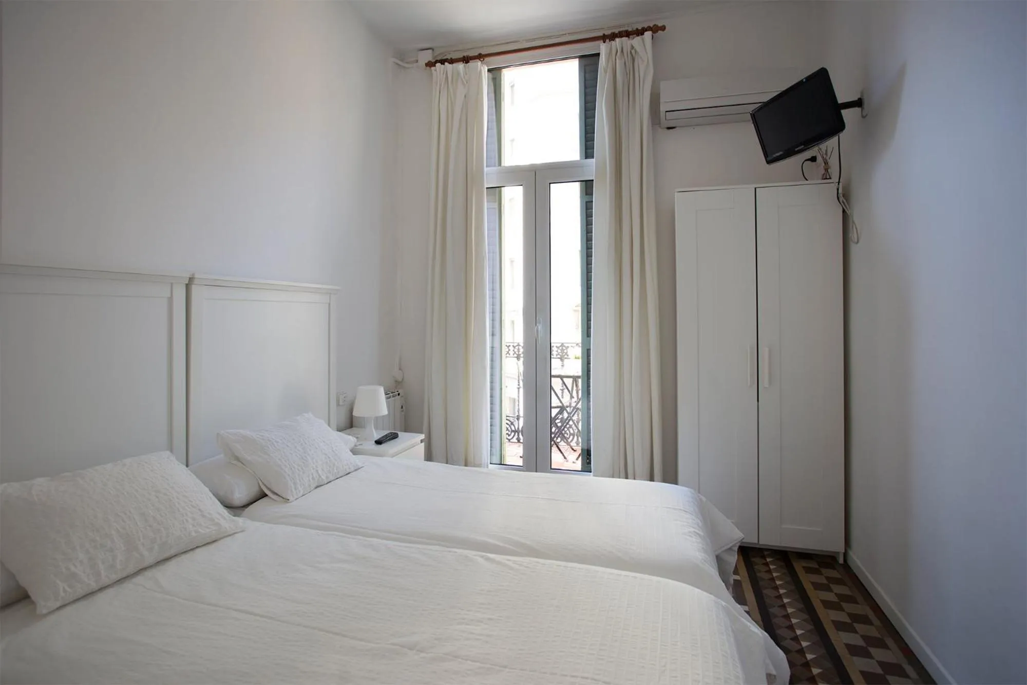 Bed in Hostal Eixample