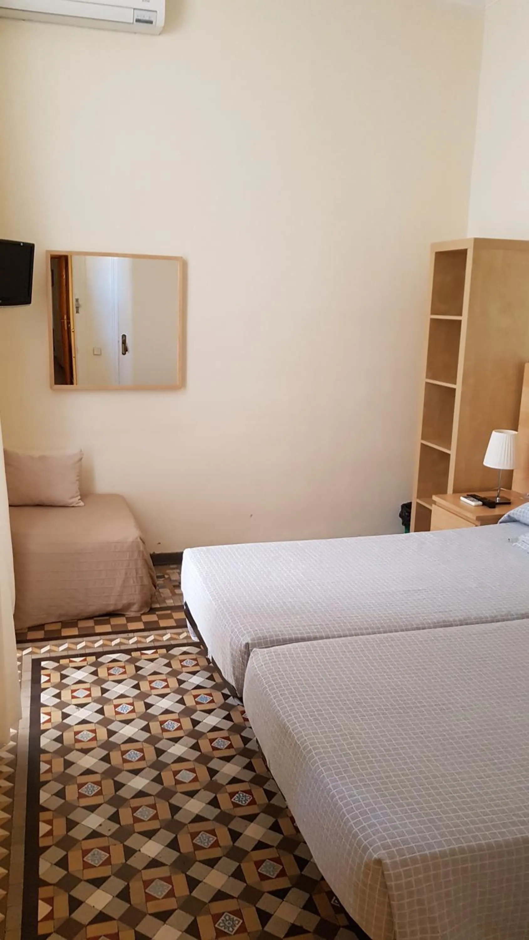 Bed in Hostal Eixample