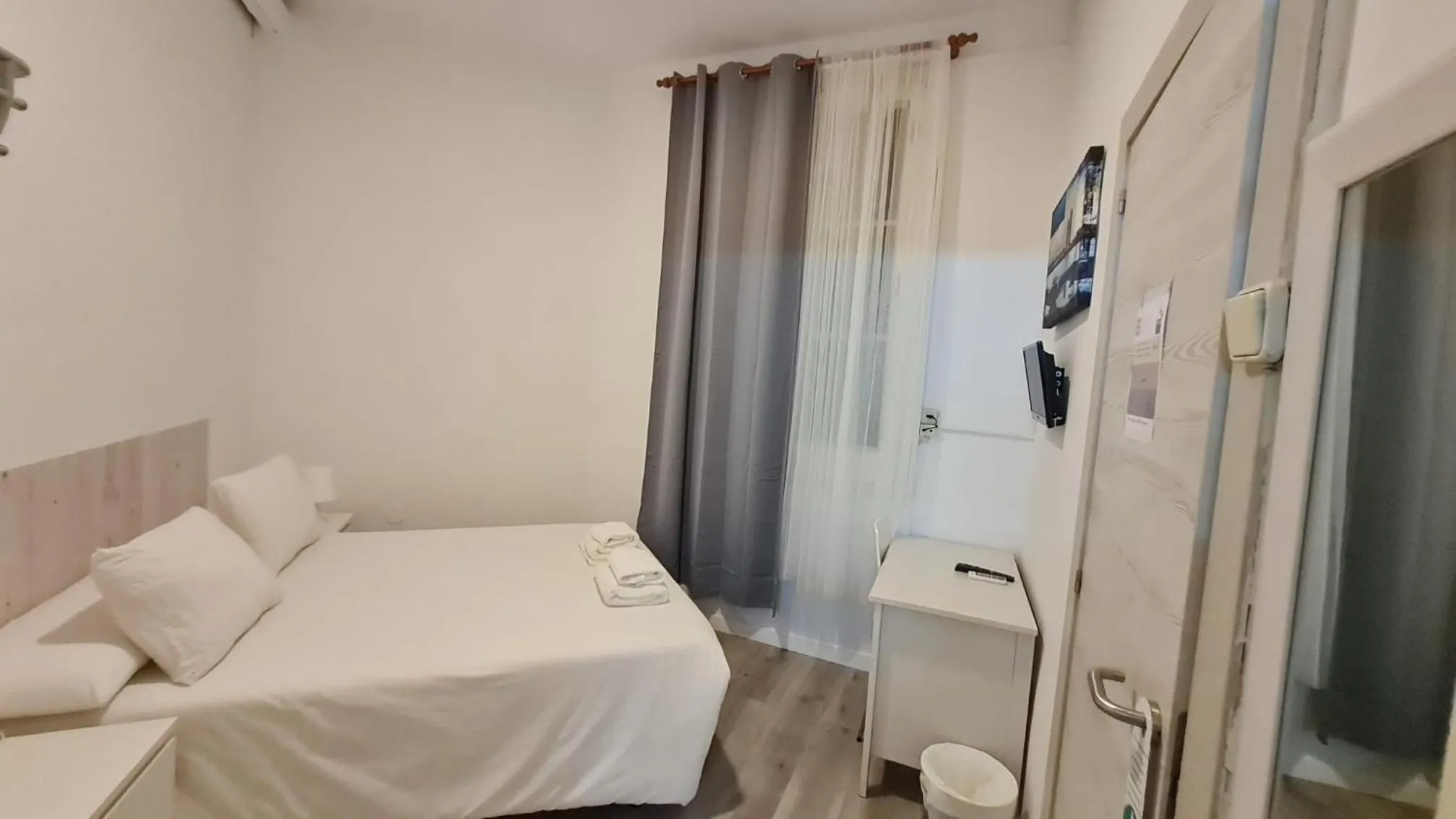 Bed in Hostal Eixample