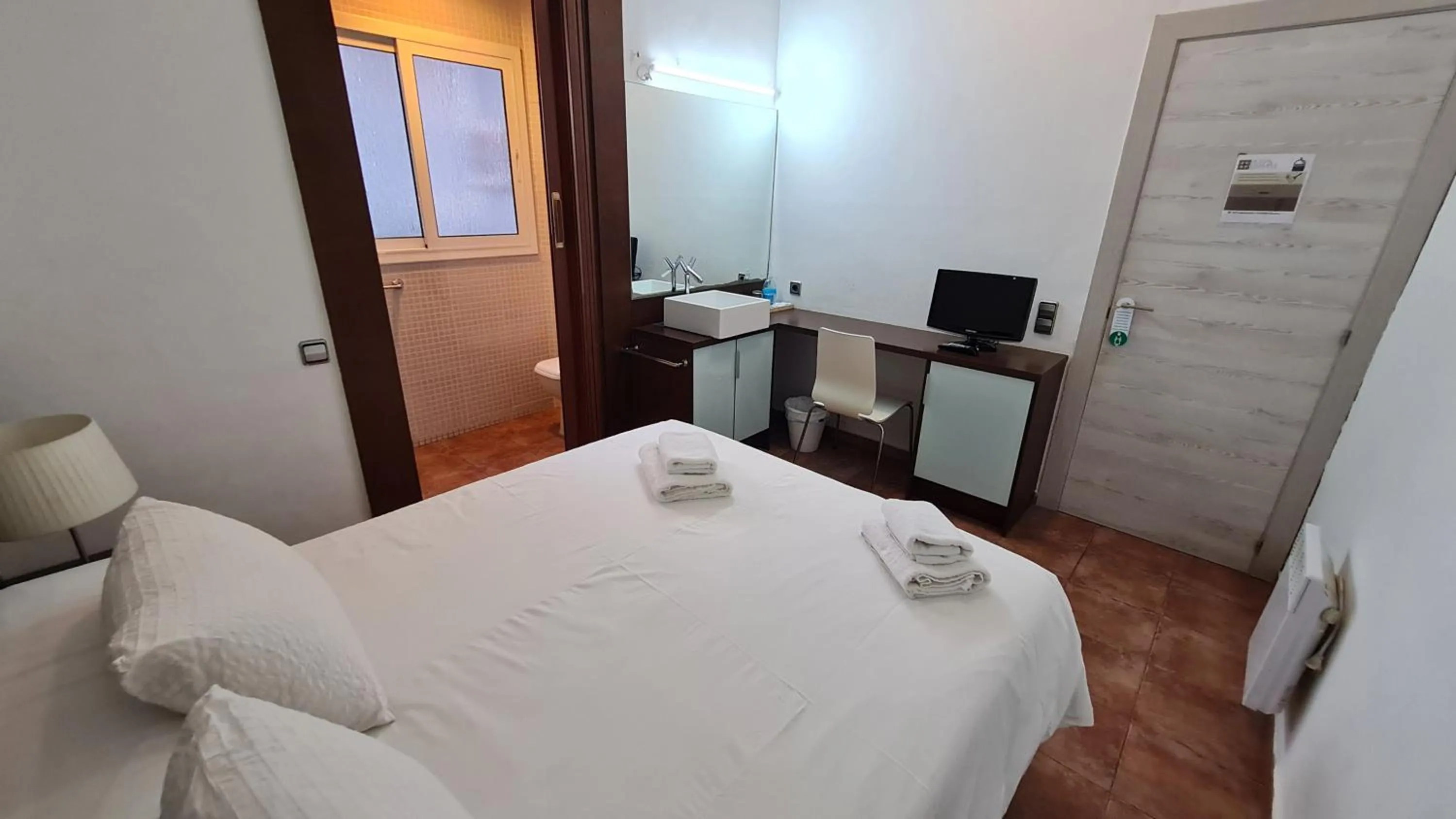 Bed in Hostal Eixample