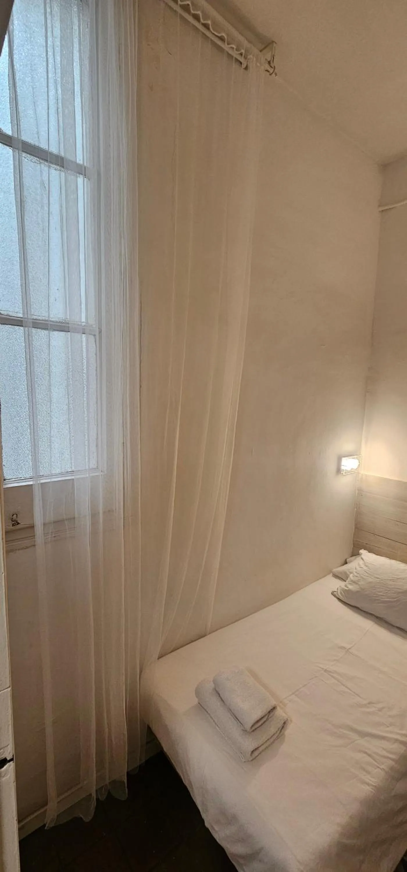 Bed in Hostal Eixample