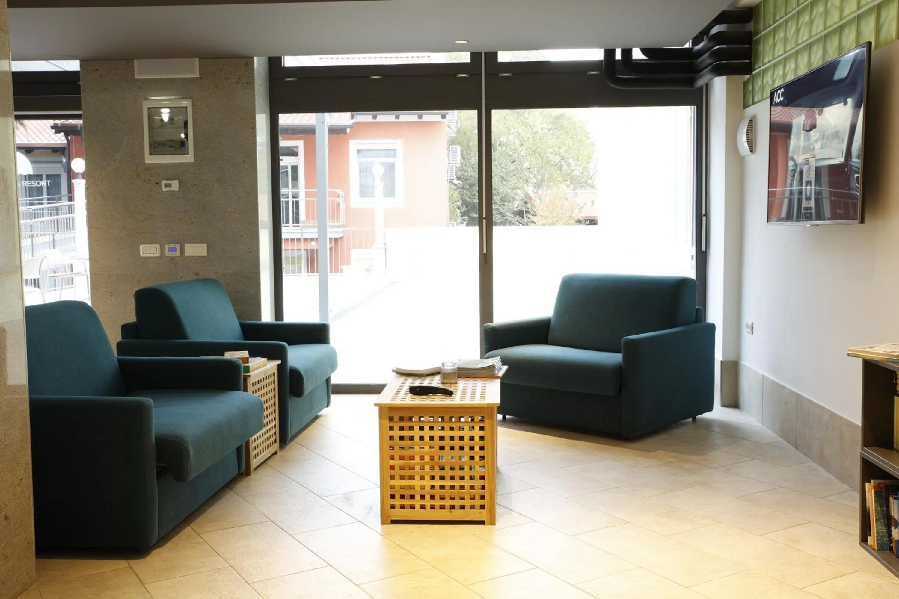 Communal lounge/ TV room in FLORAMARE HEALTH RESORT