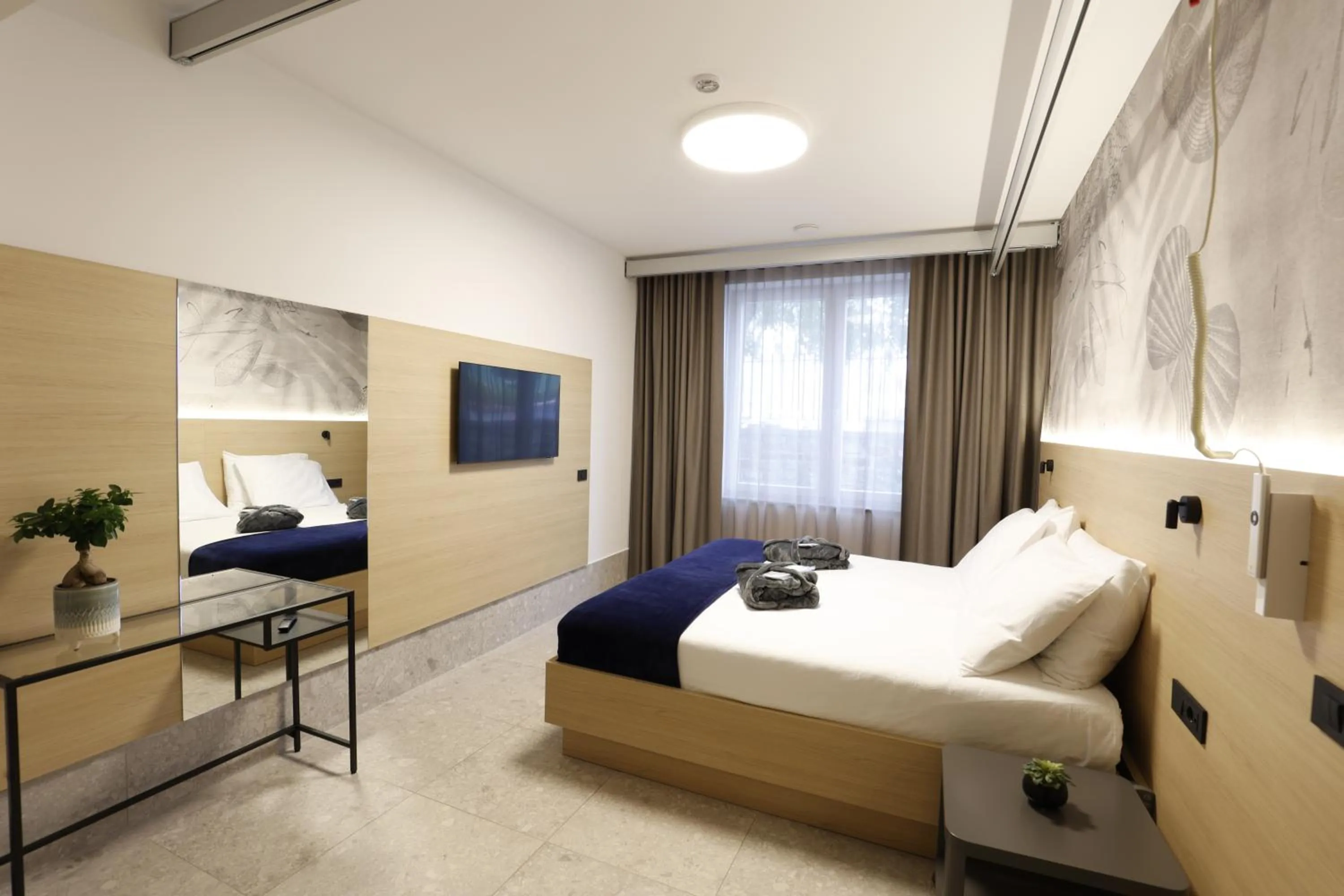 Bed in FLORAMARE HEALTH RESORT