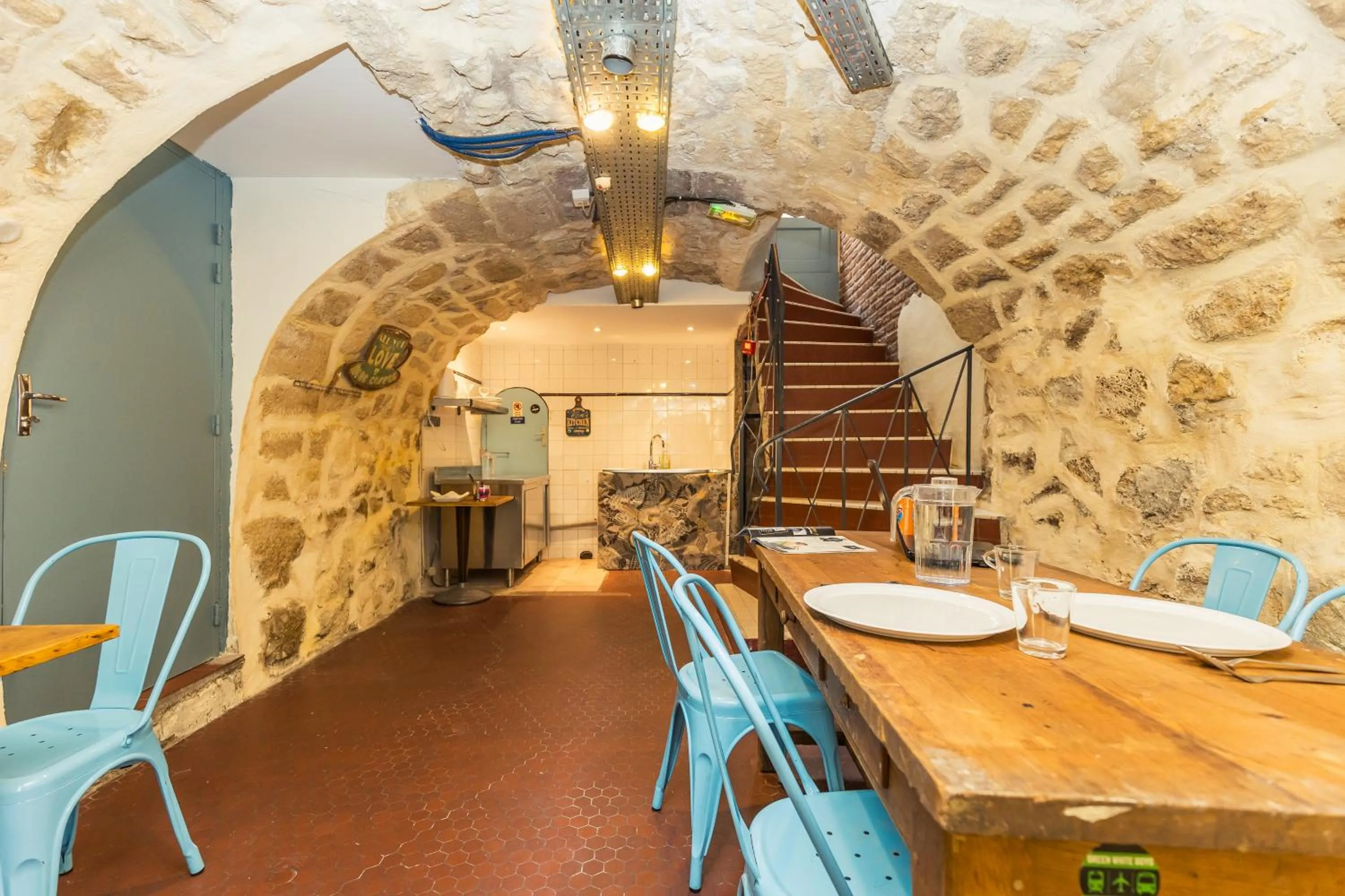 Seating area in Young and Happy Latin Quarter by Hiphophostels