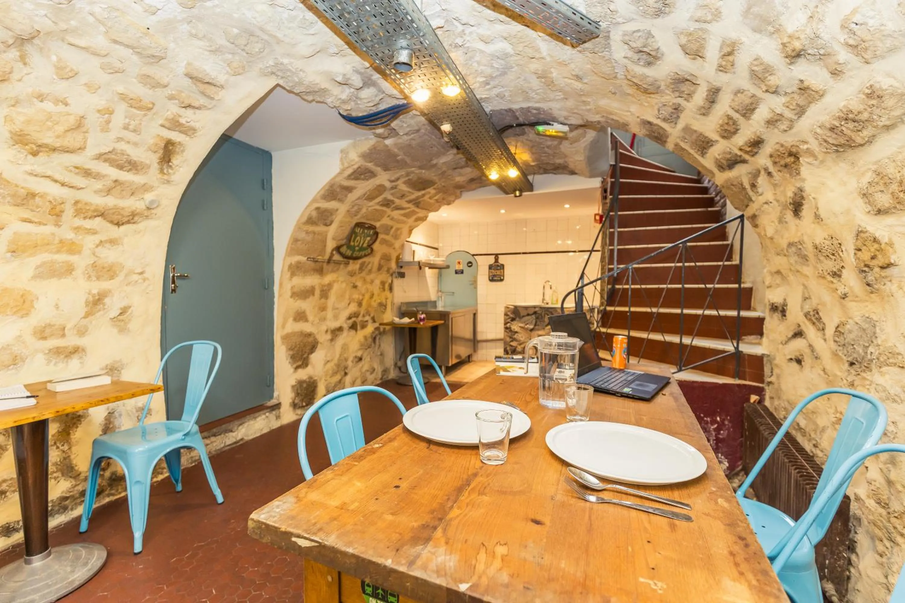 Seating area in Young and Happy Latin Quarter by Hiphophostels