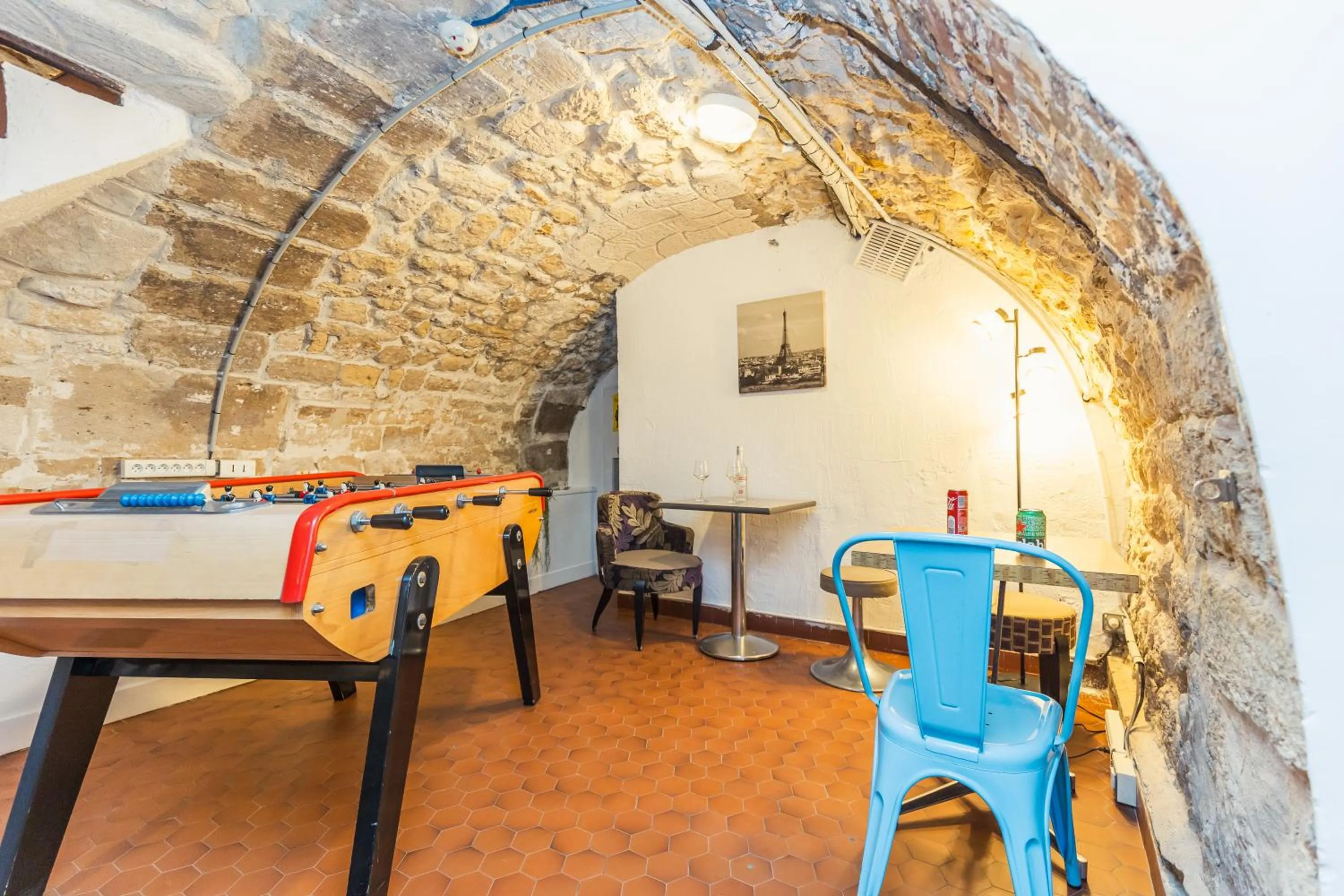 Game Room in Young and Happy Latin Quarter by Hiphophostels