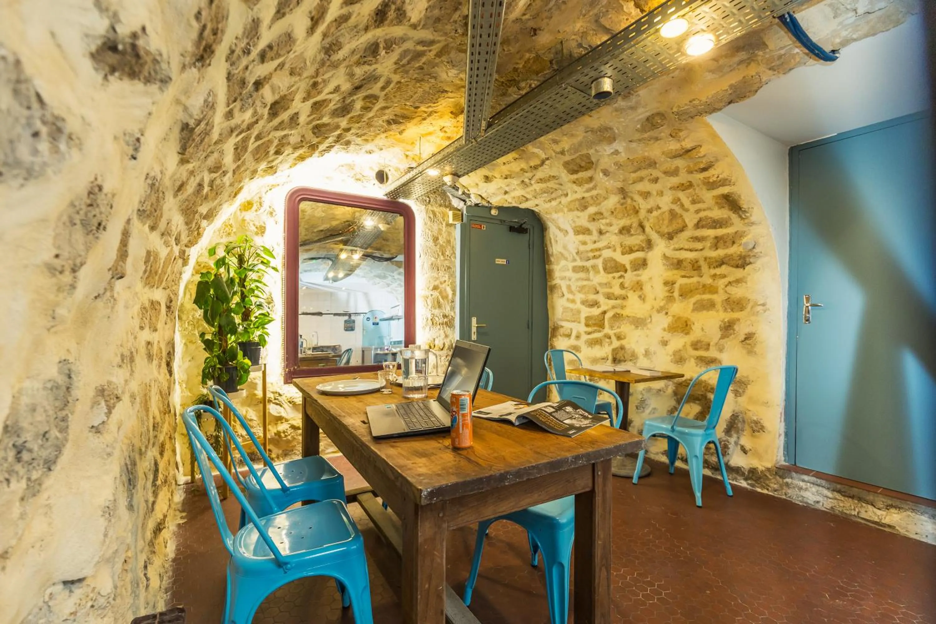 Seating area in Young and Happy Latin Quarter by Hiphophostels