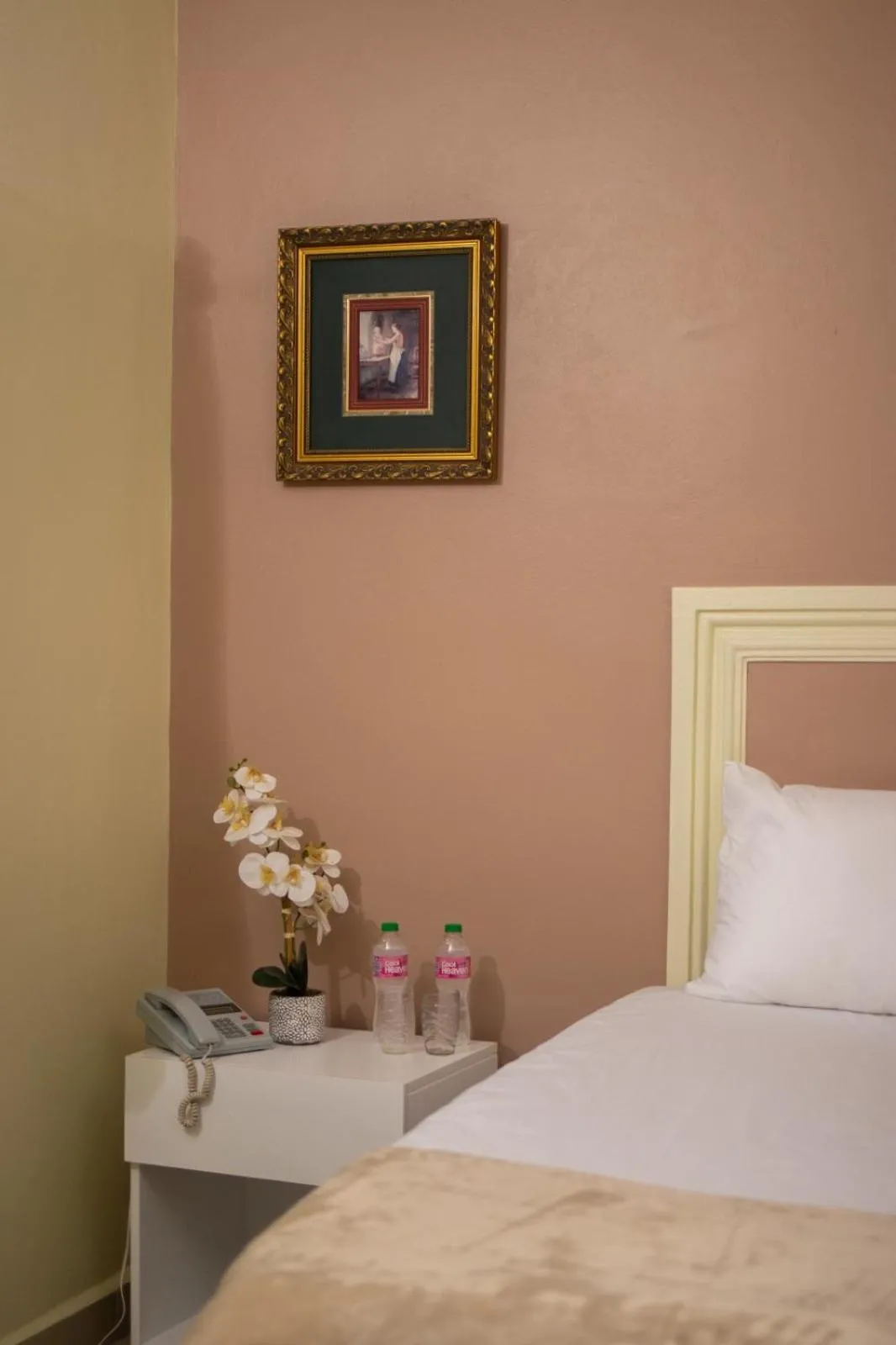 Bed in Diosamar Hotel y Suites