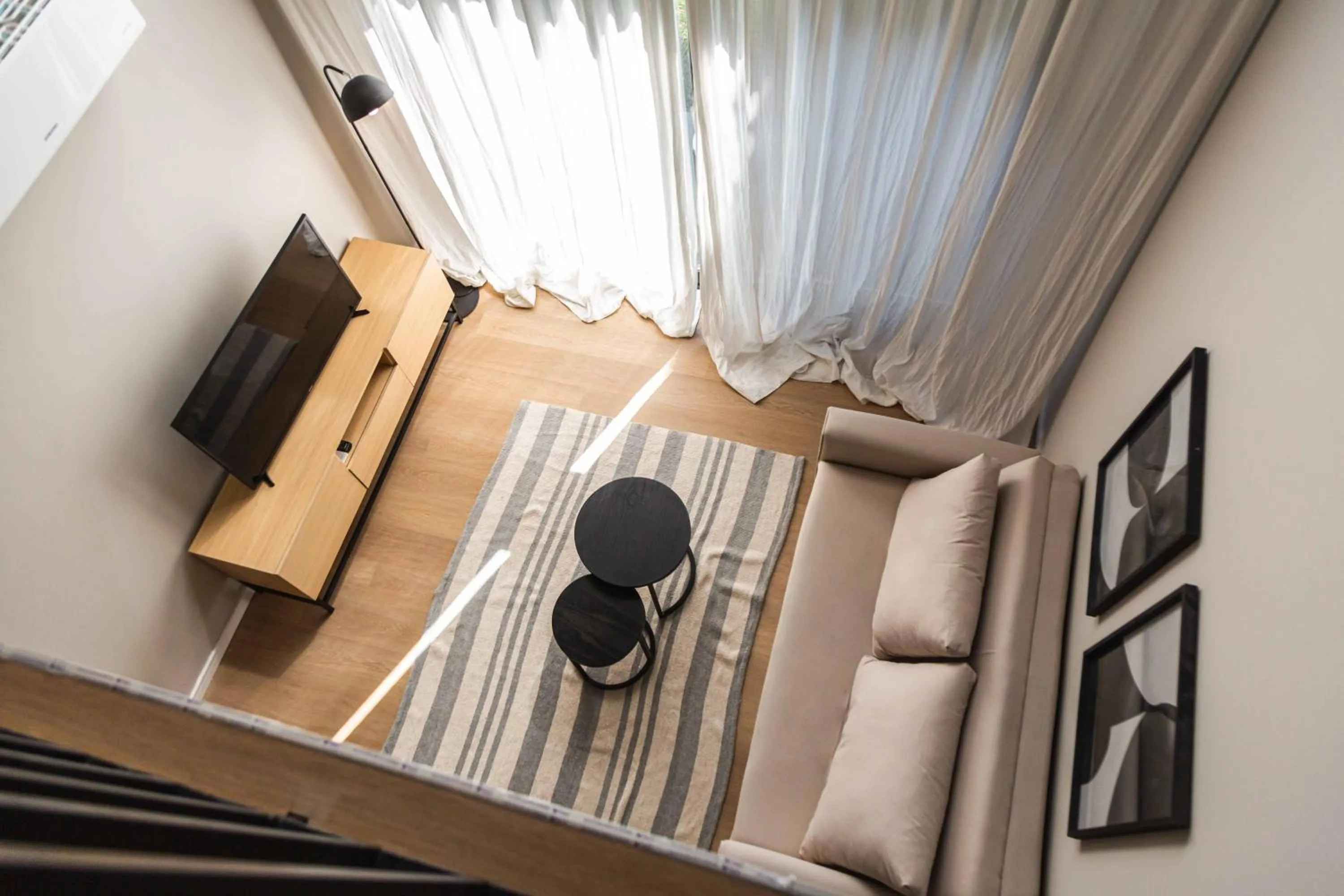 Living room in Milenia Soho by iPPA