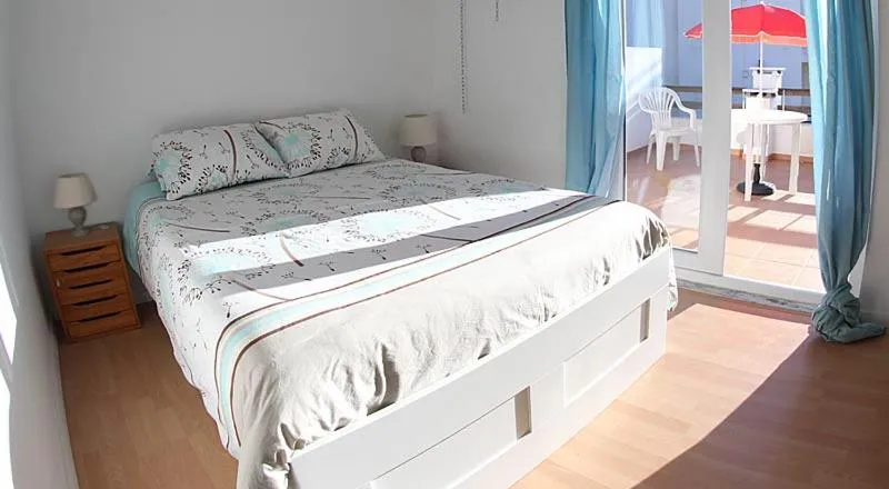 Bed in Native Surfhouse