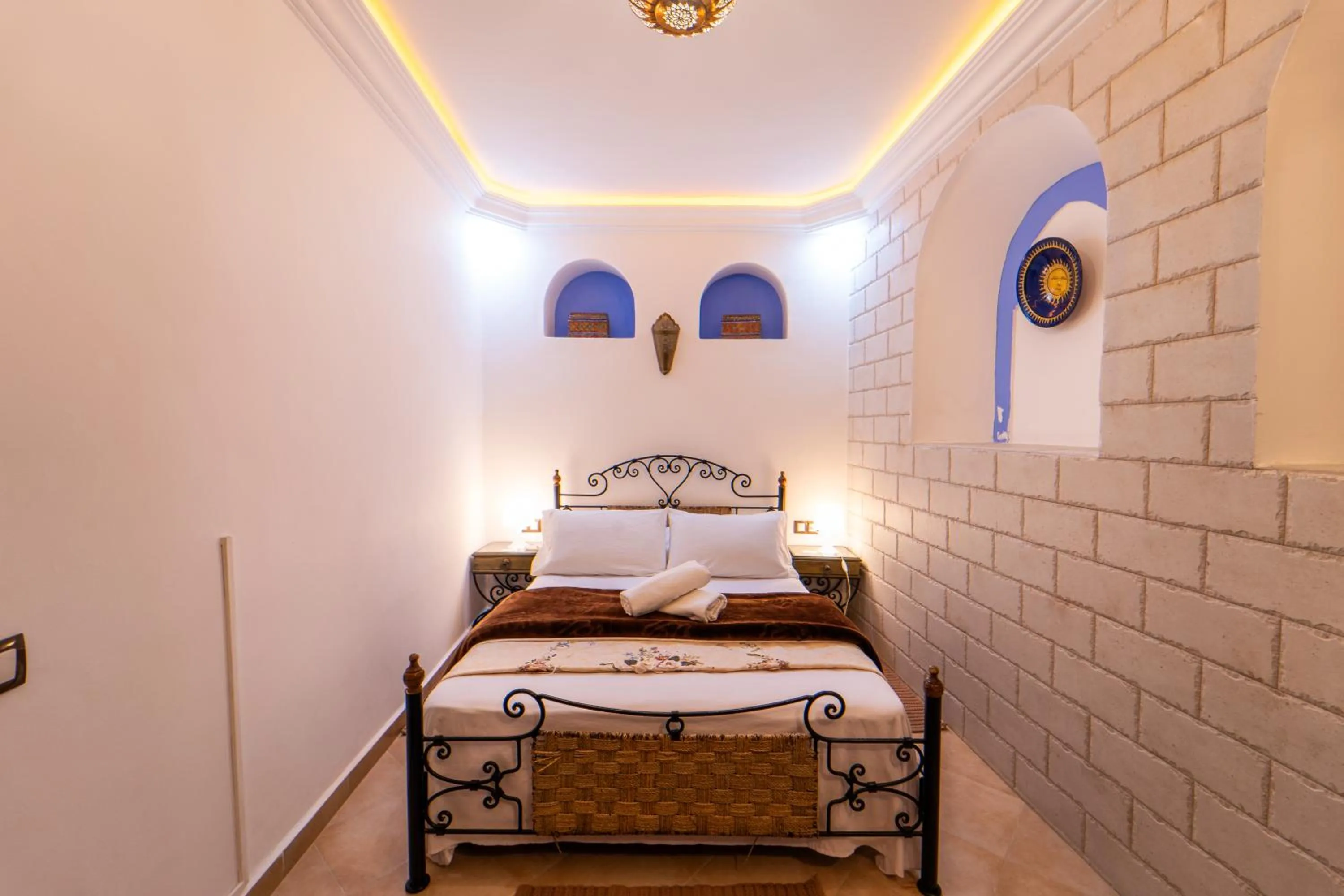 Bed in DAR NOKHBA INN