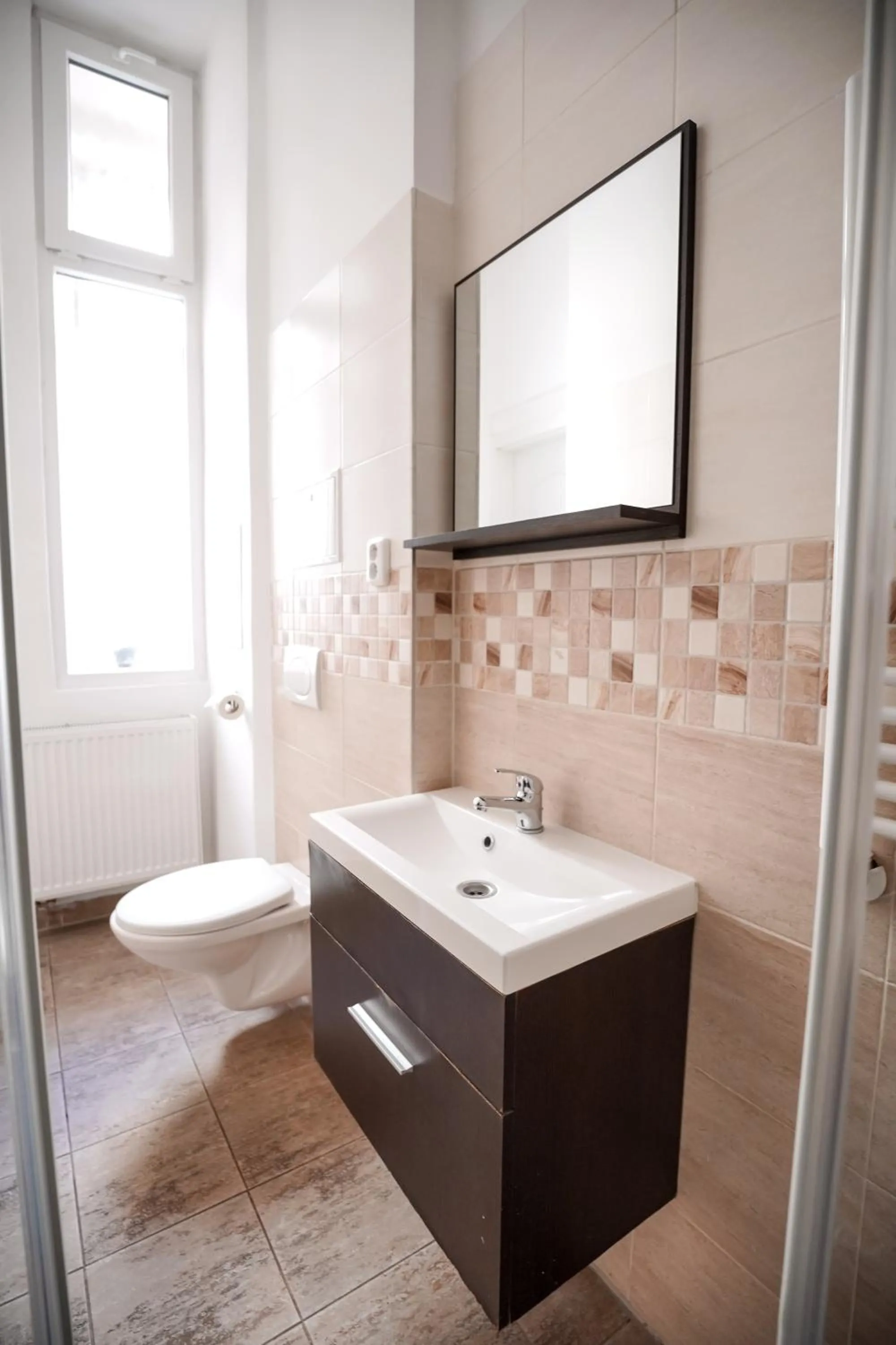 Bathroom in Elegant & Stylish Center Apartments!