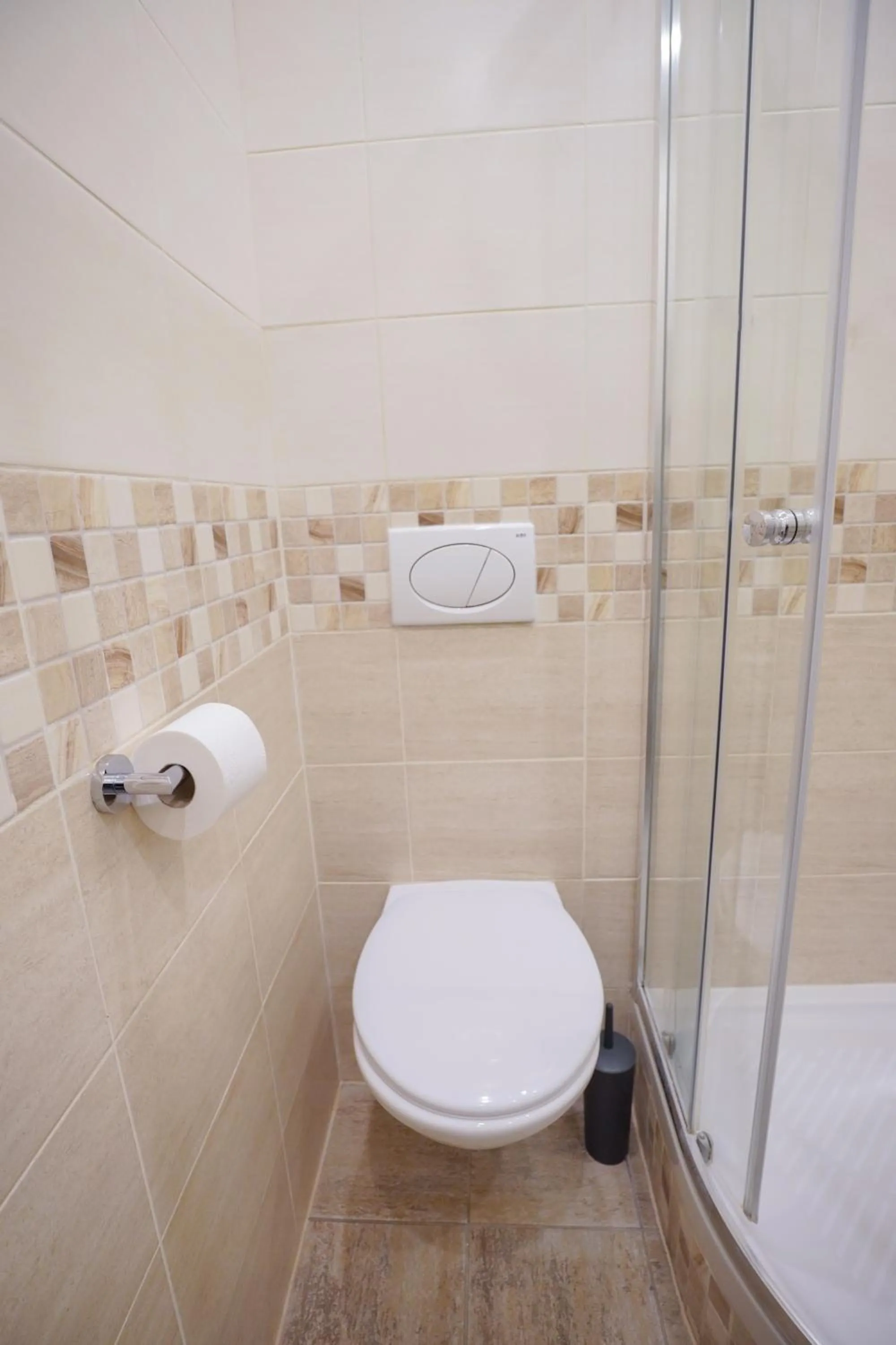 Toilet in Elegant & Stylish Center Apartments!