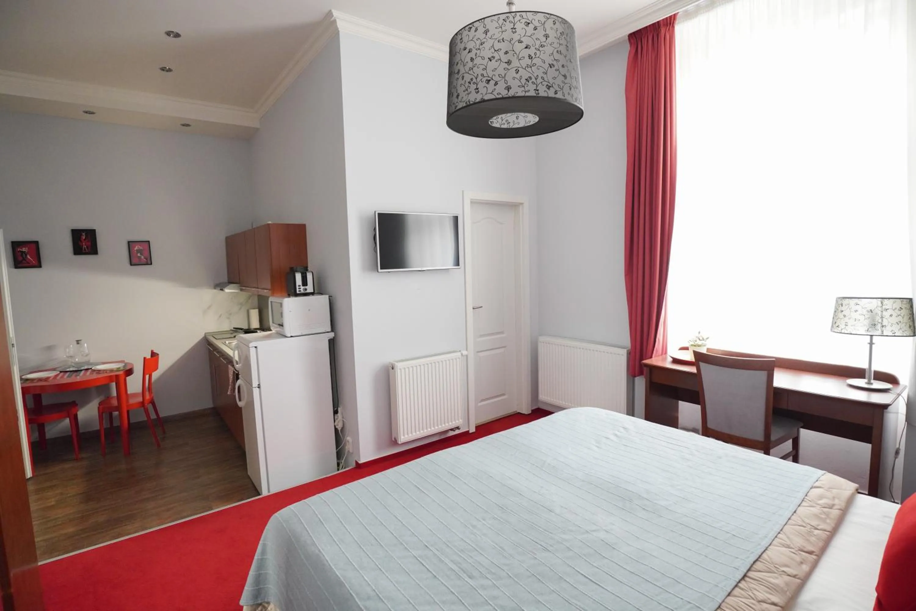 Photo of the whole room, Bed in Elegant & Stylish Center Apartments!