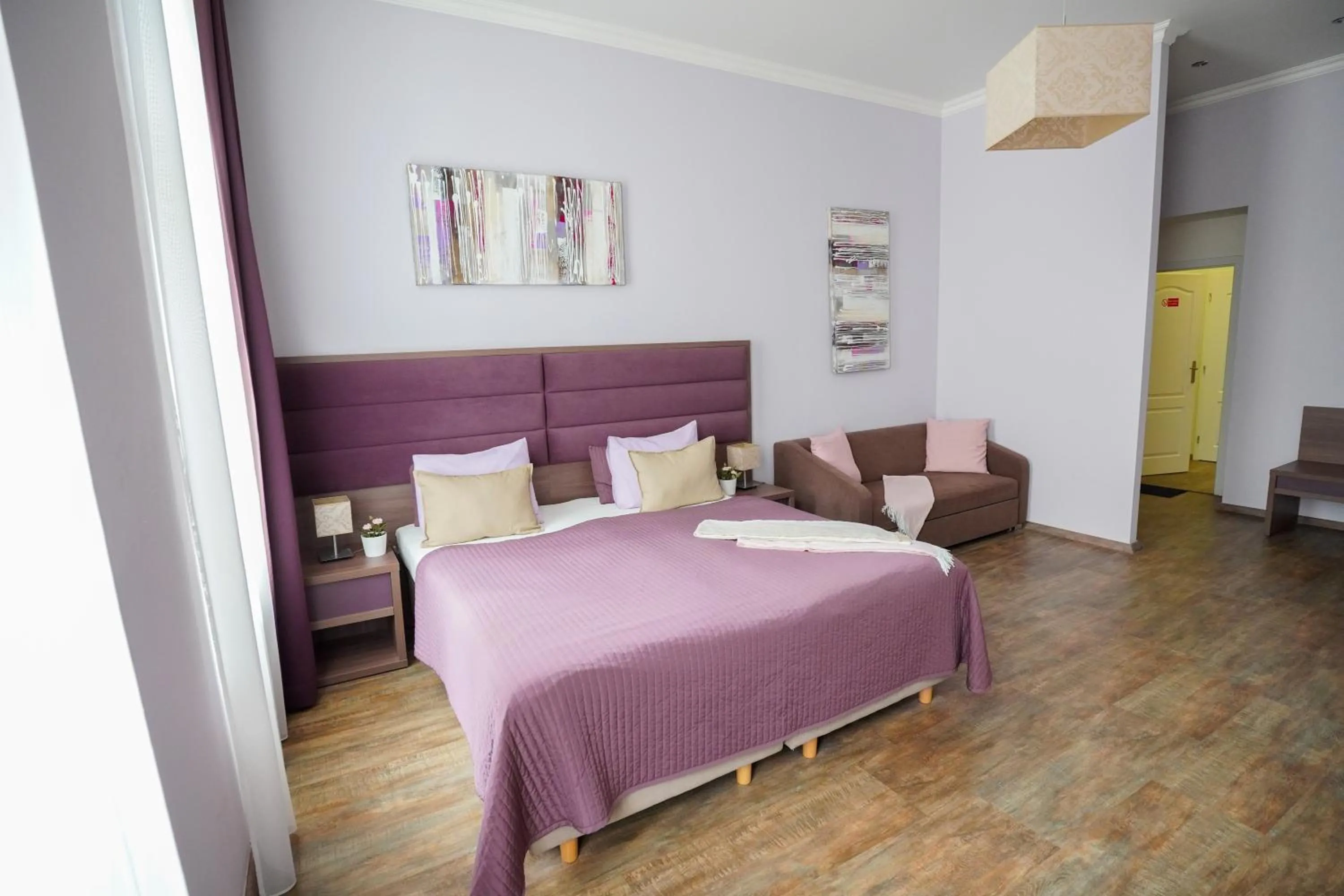 Photo of the whole room, Bed in Elegant & Stylish Center Apartments!