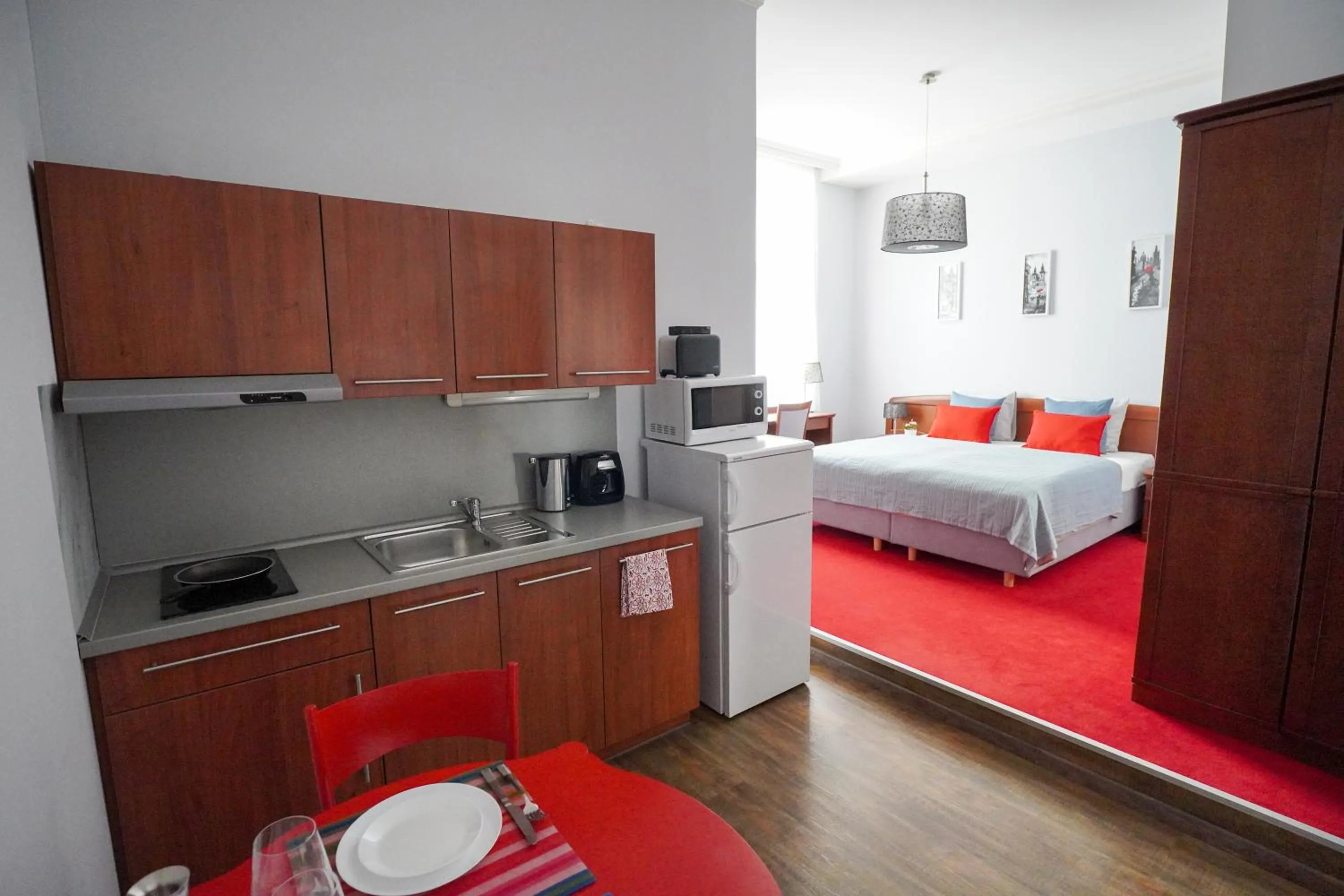 Kitchen or kitchenette, Bed in Elegant & Stylish Center Apartments!