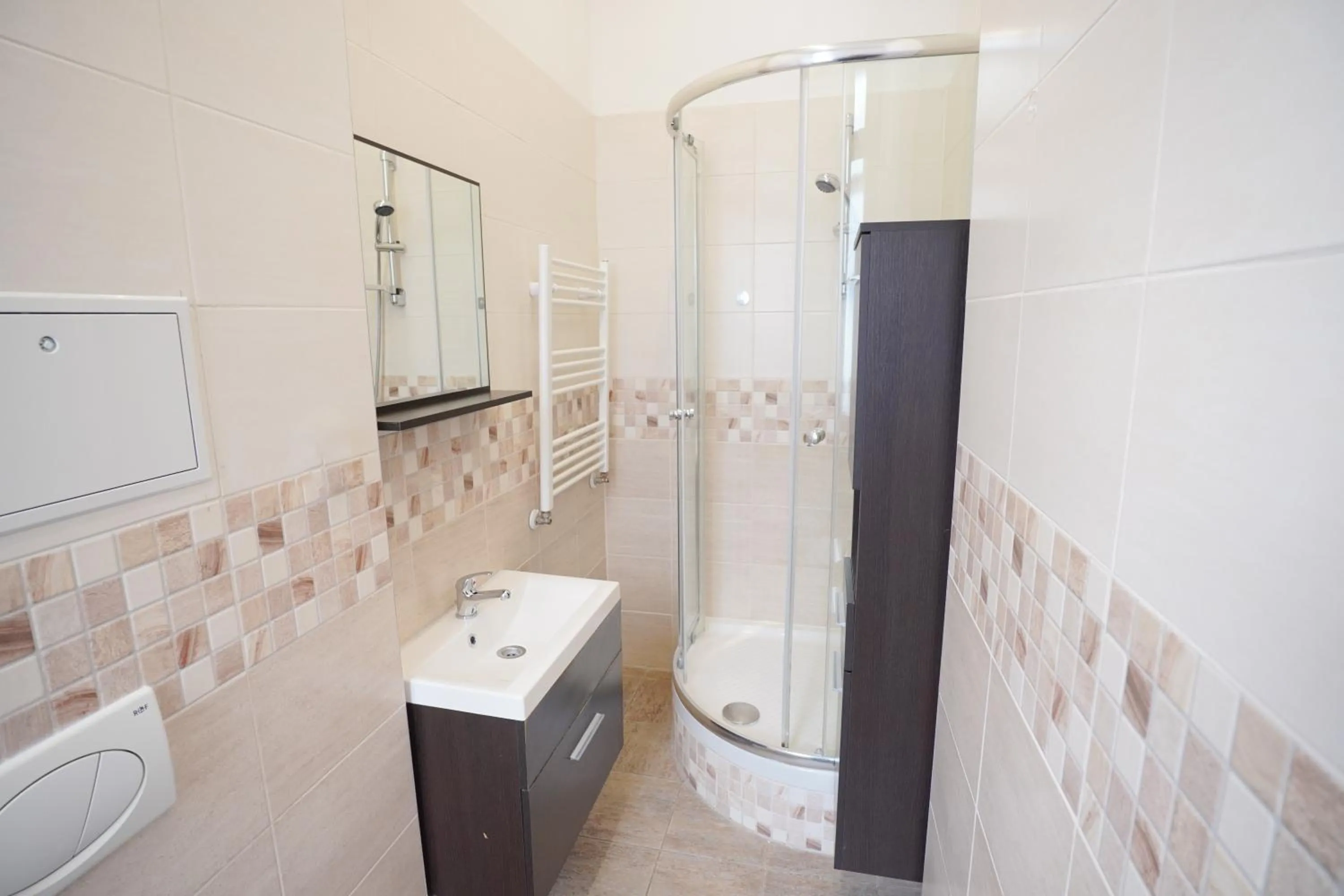 Shower in Elegant & Stylish Center Apartments!
