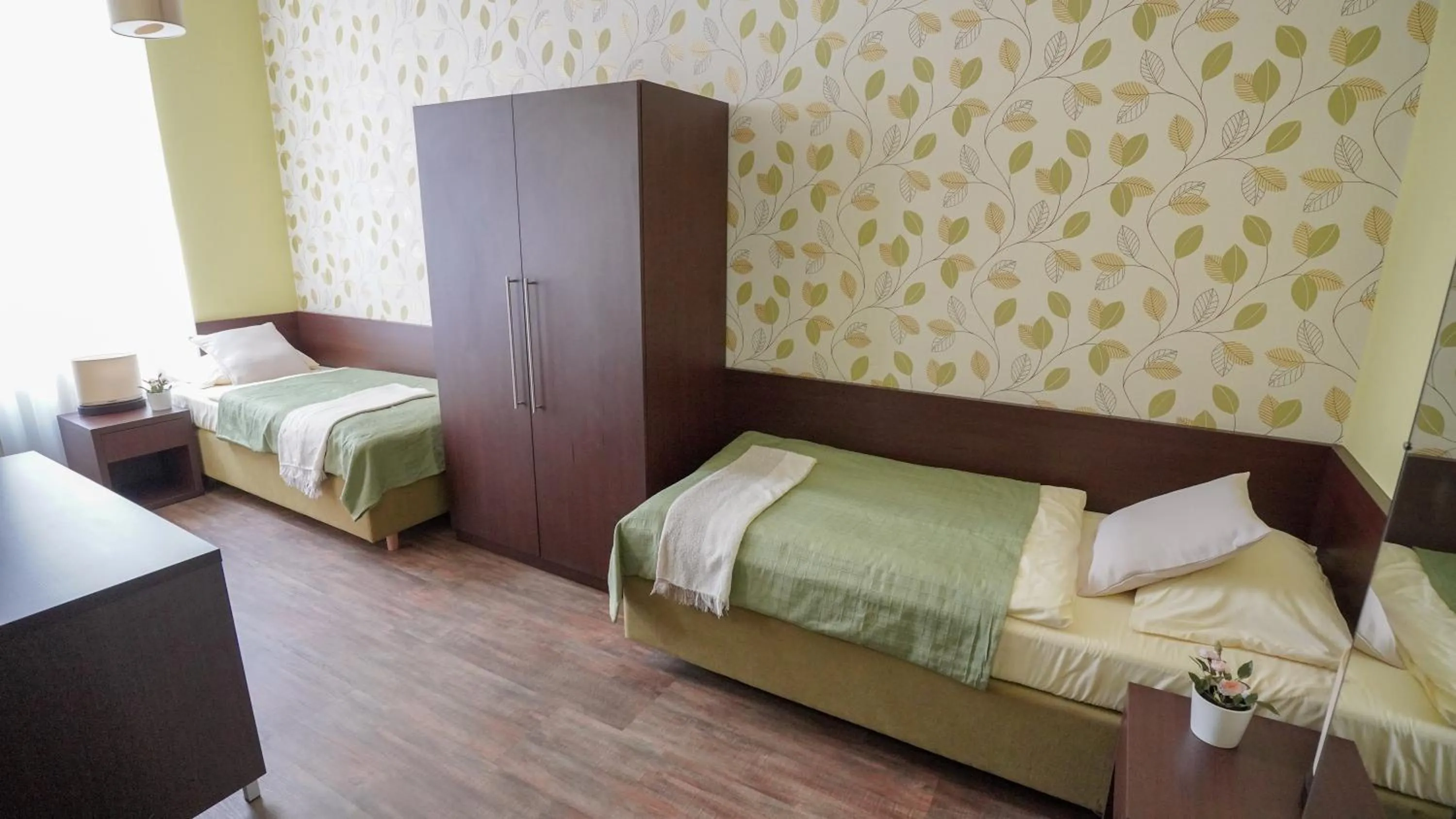 Bed in Elegant & Stylish Center Apartments!