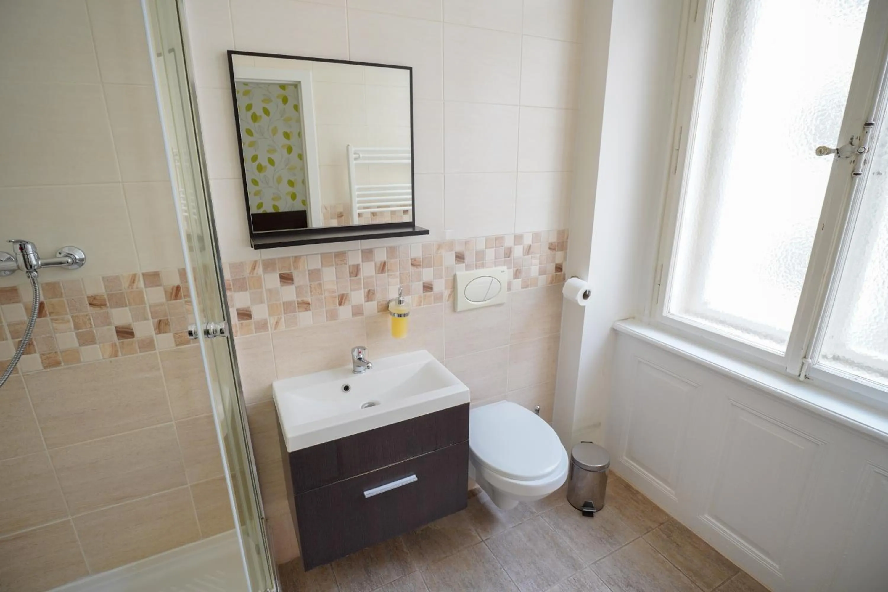 Bathroom in Elegant & Stylish Center Apartments!