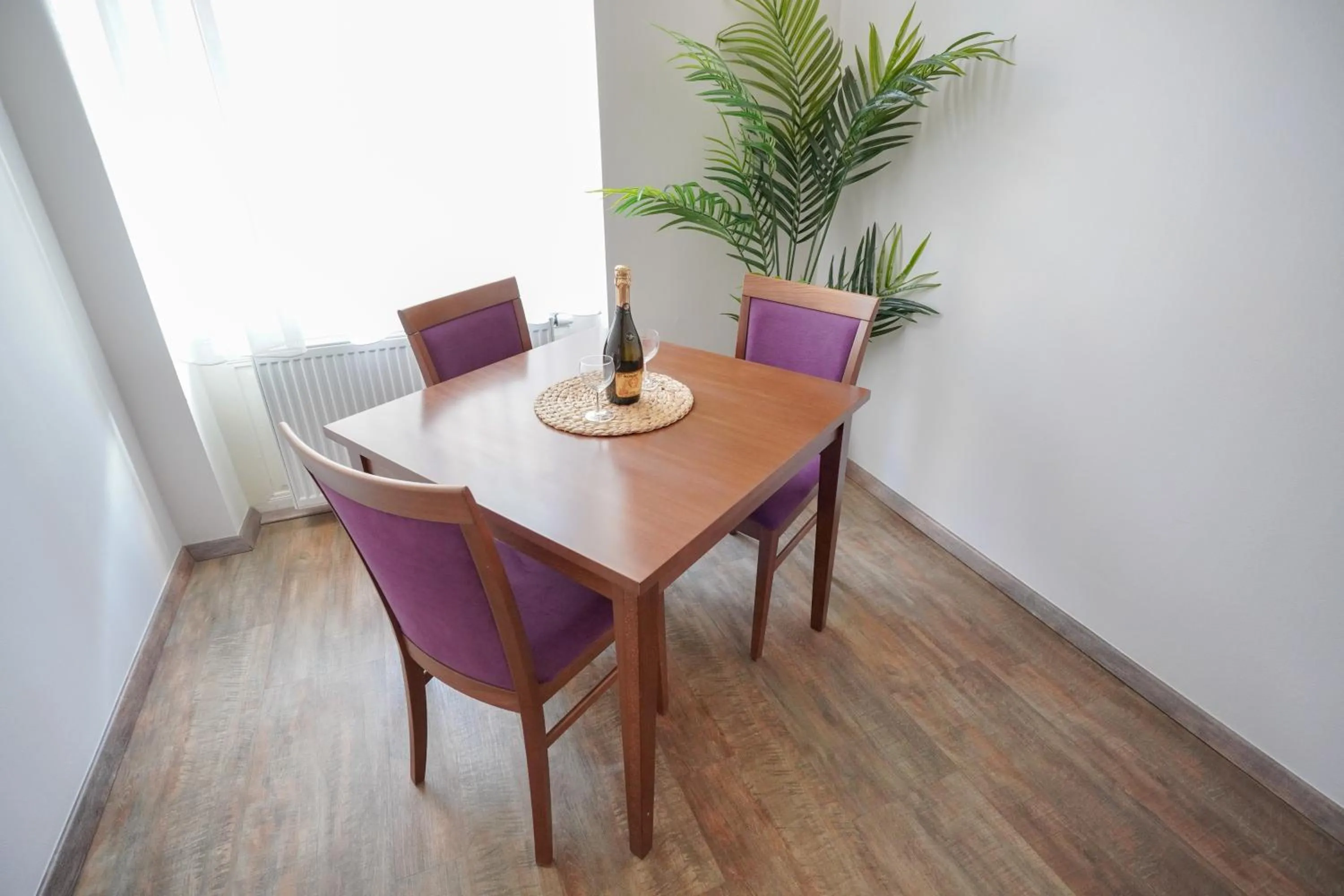 Seating area in Elegant & Stylish Center Apartments!
