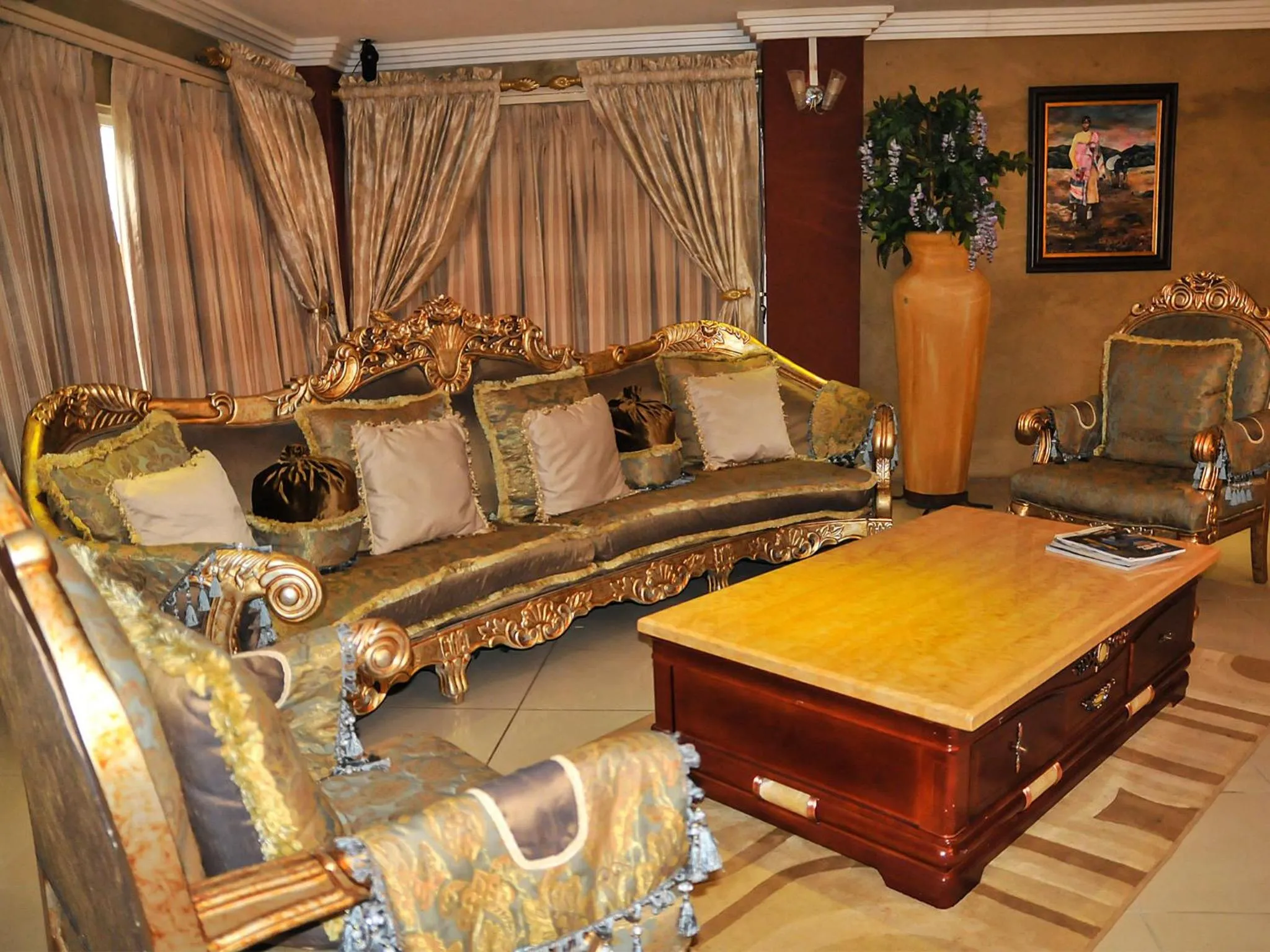 Communal lounge/ TV room in 2Ten Hotel