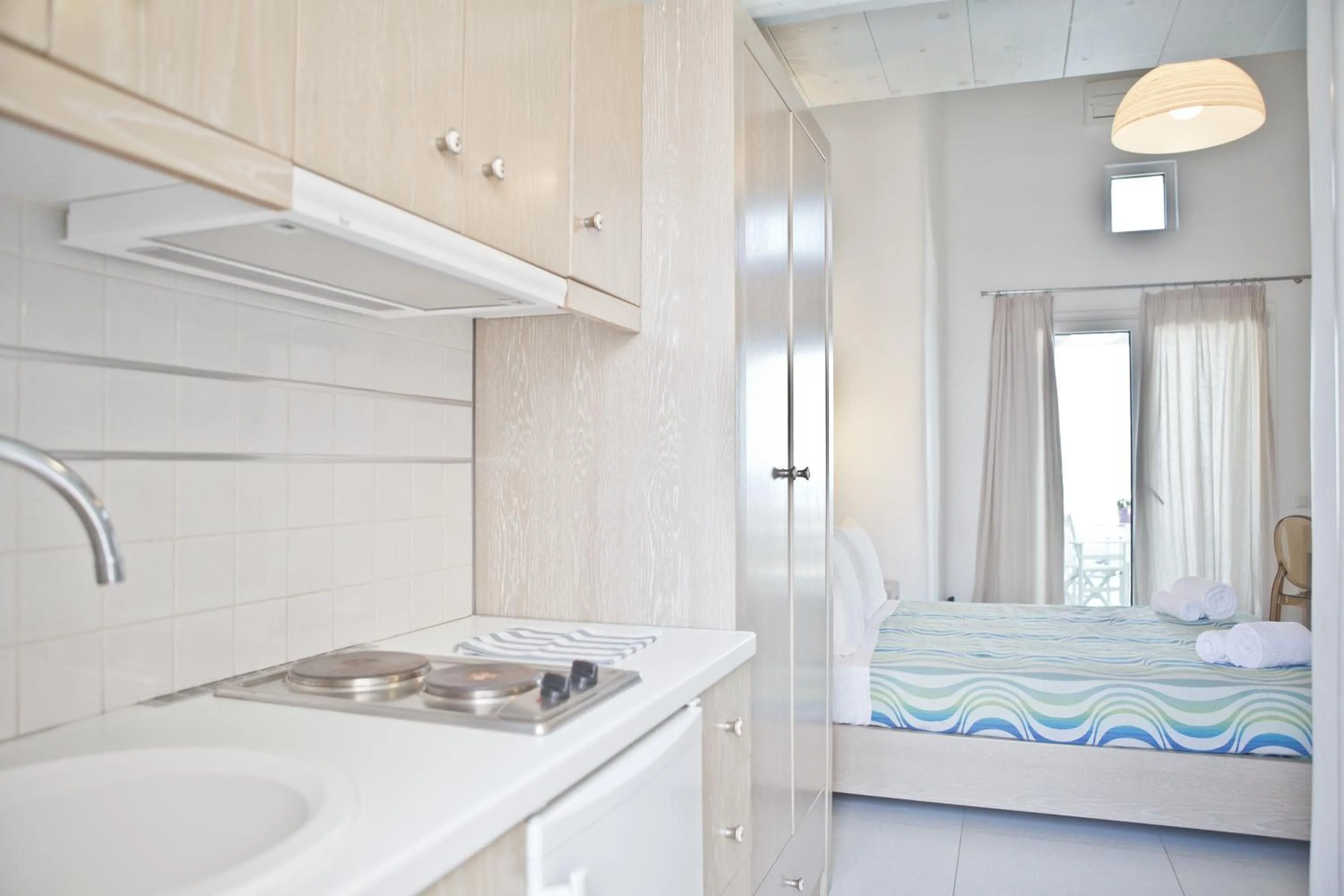 Bed in Niriides Homes & Villas