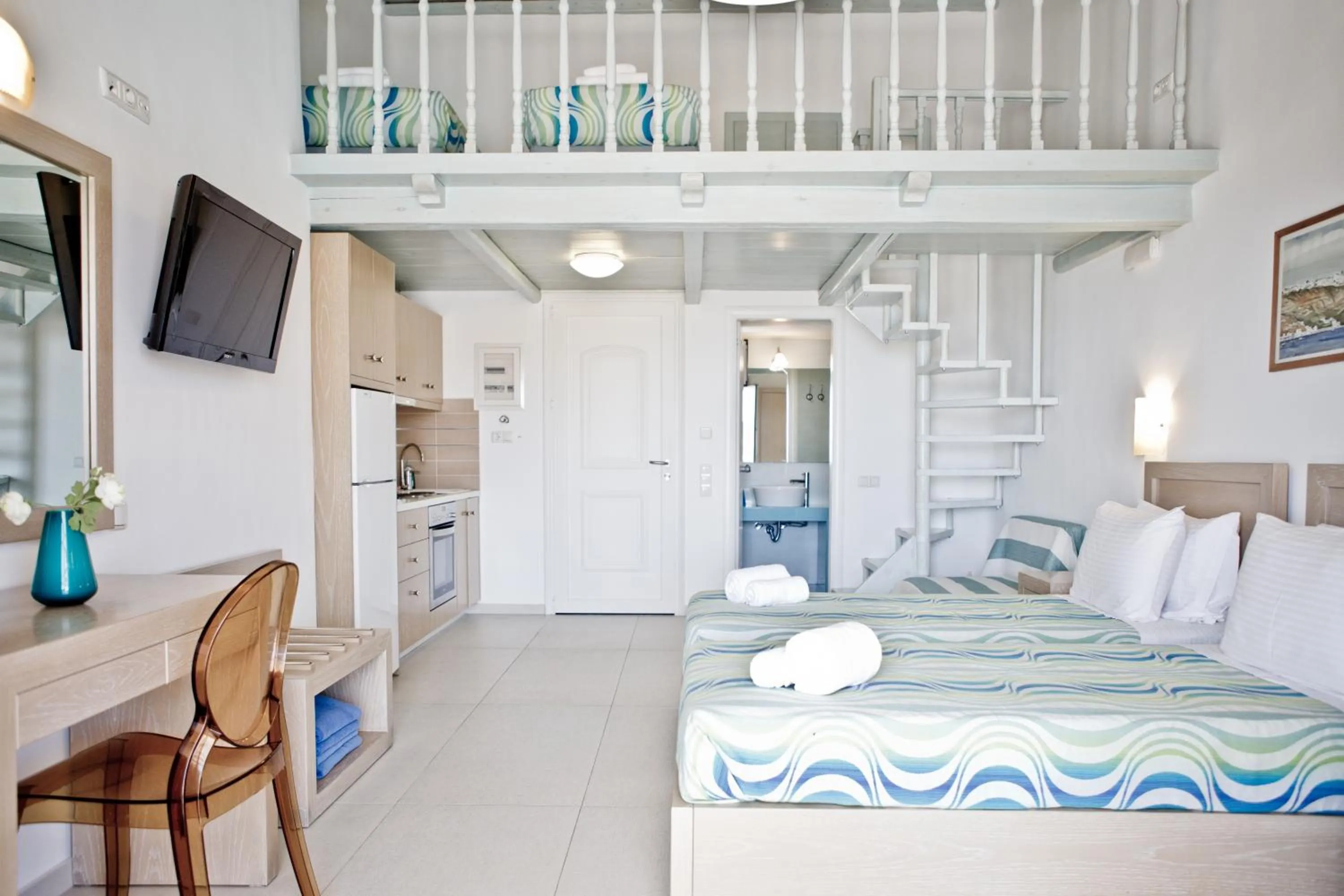 Kitchen or kitchenette, Bed in Niriides Homes & Villas