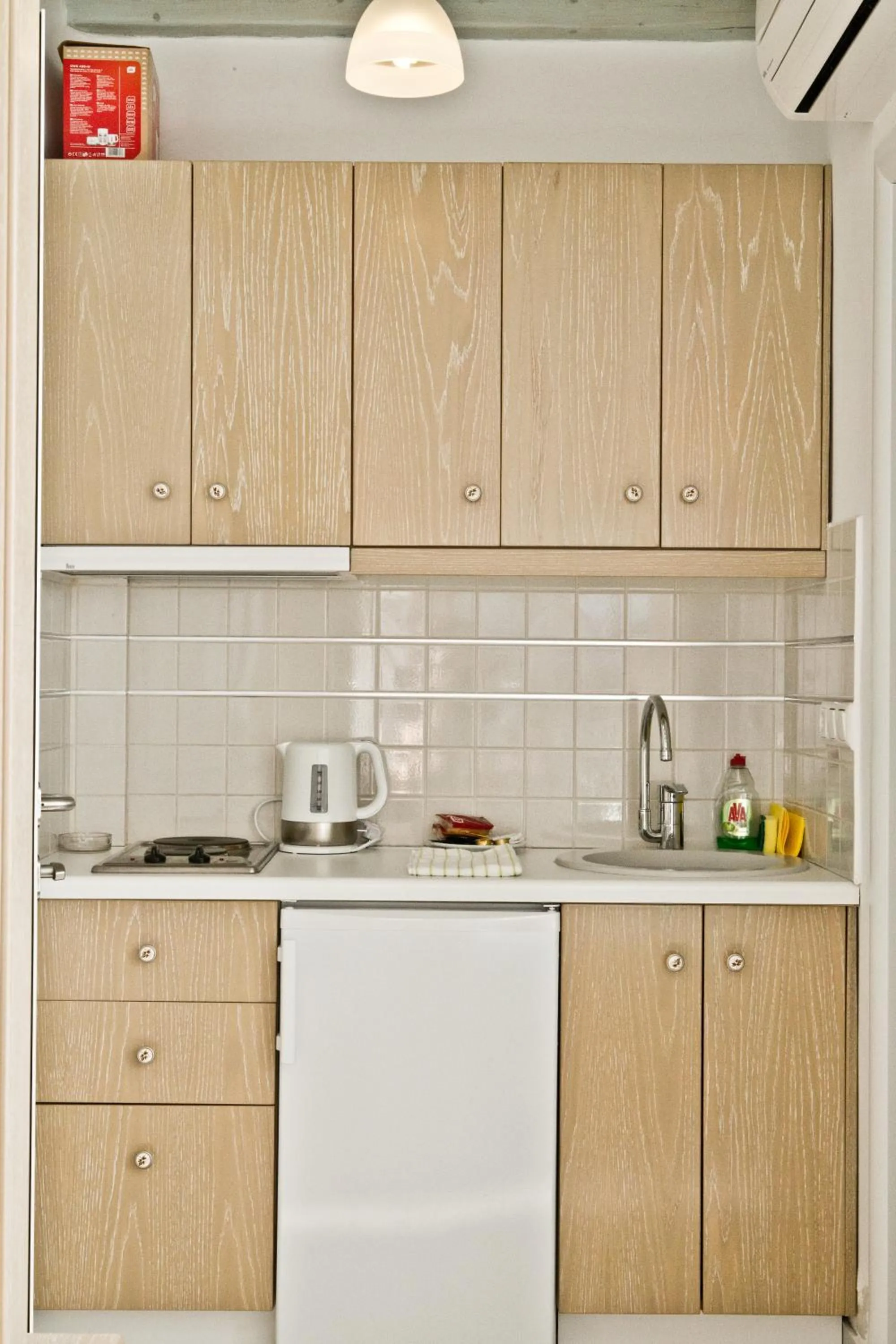 Kitchen or kitchenette in Niriides Homes & Villas