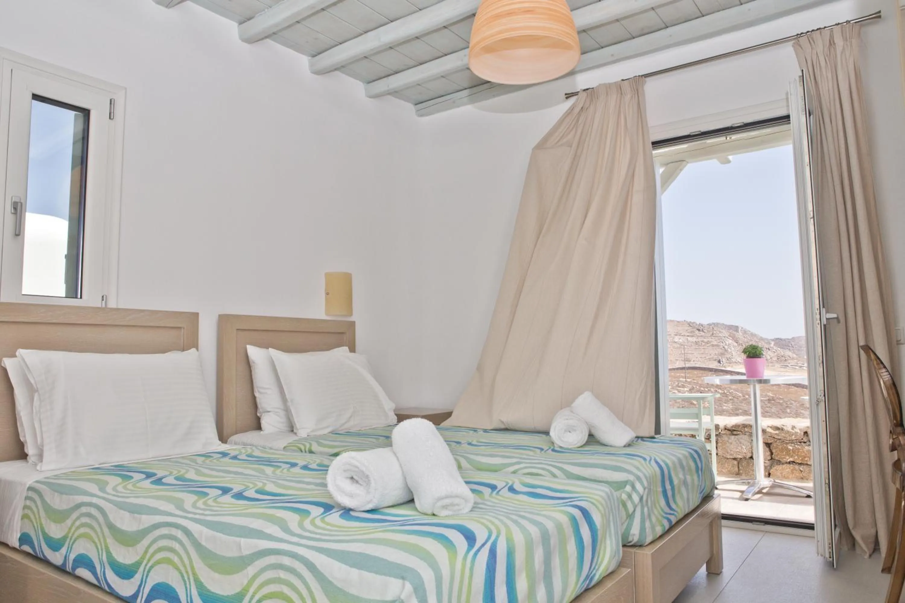 Bed in Niriides Homes & Villas