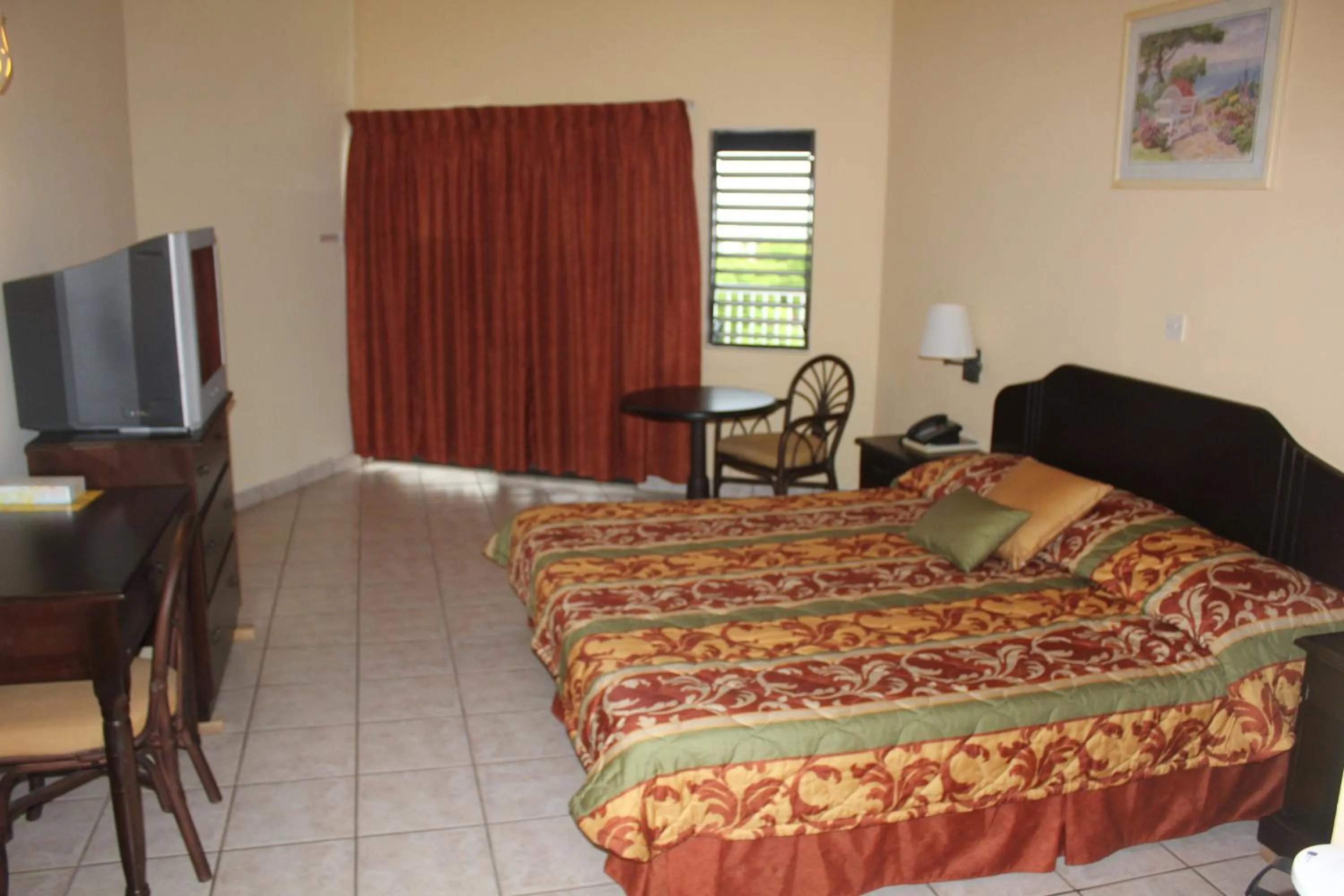 Photo of the whole room, Bed in Allamanda Beach Resort