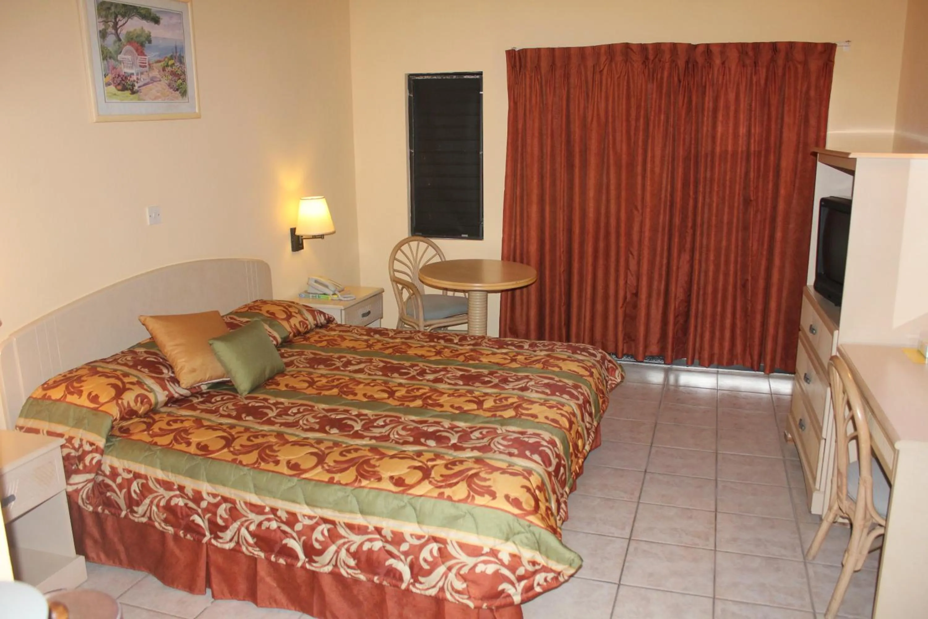 Photo of the whole room, Bed in Allamanda Beach Resort