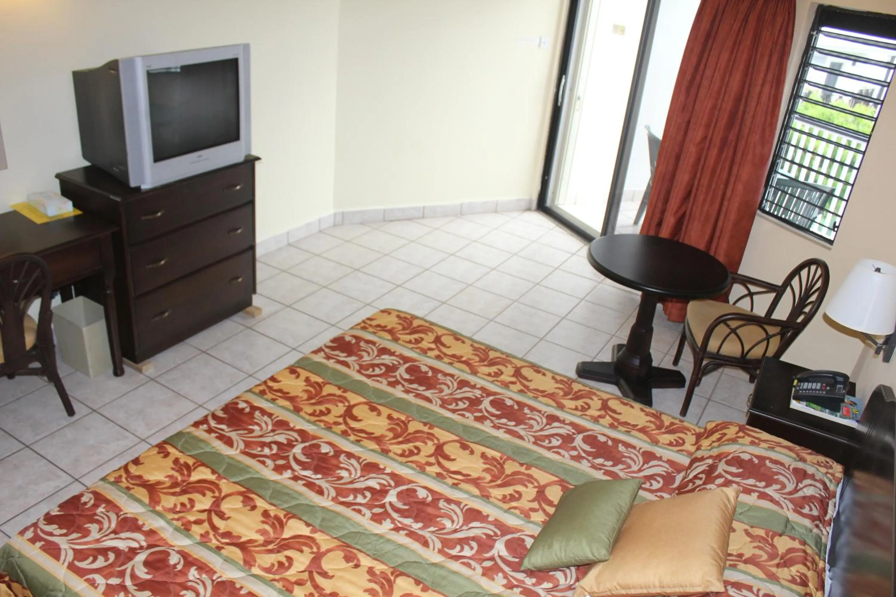 Photo of the whole room, Bed in Allamanda Beach Resort