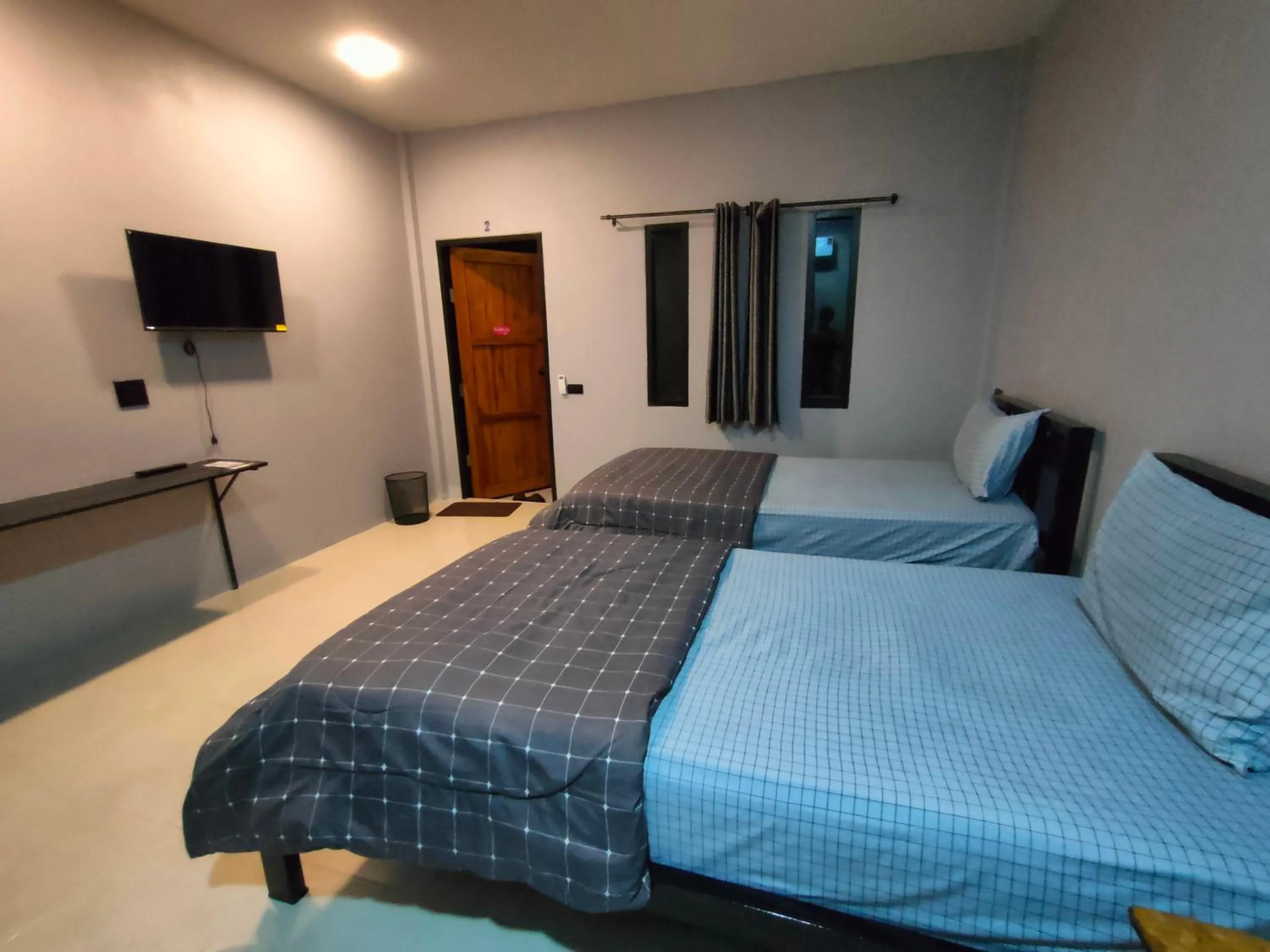 Bed in เช็คอินรีสอร์ท Check-in Resort